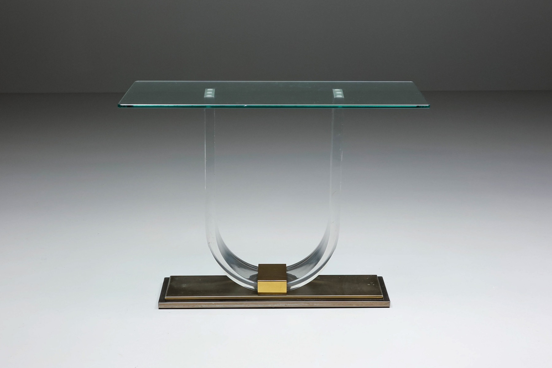Belgo Chrome console table in lucite and brass from the 1970s design