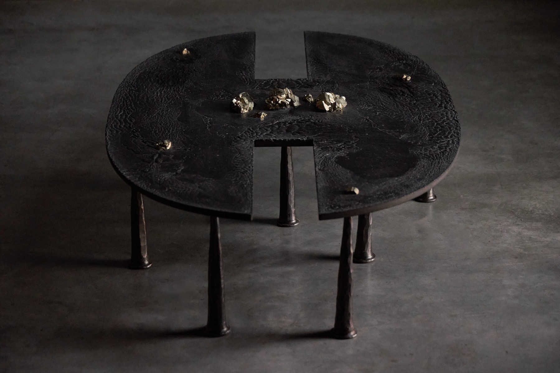 Contemporary brutalist coffee table in iron with mineral inclusions by Thomas Serruys
