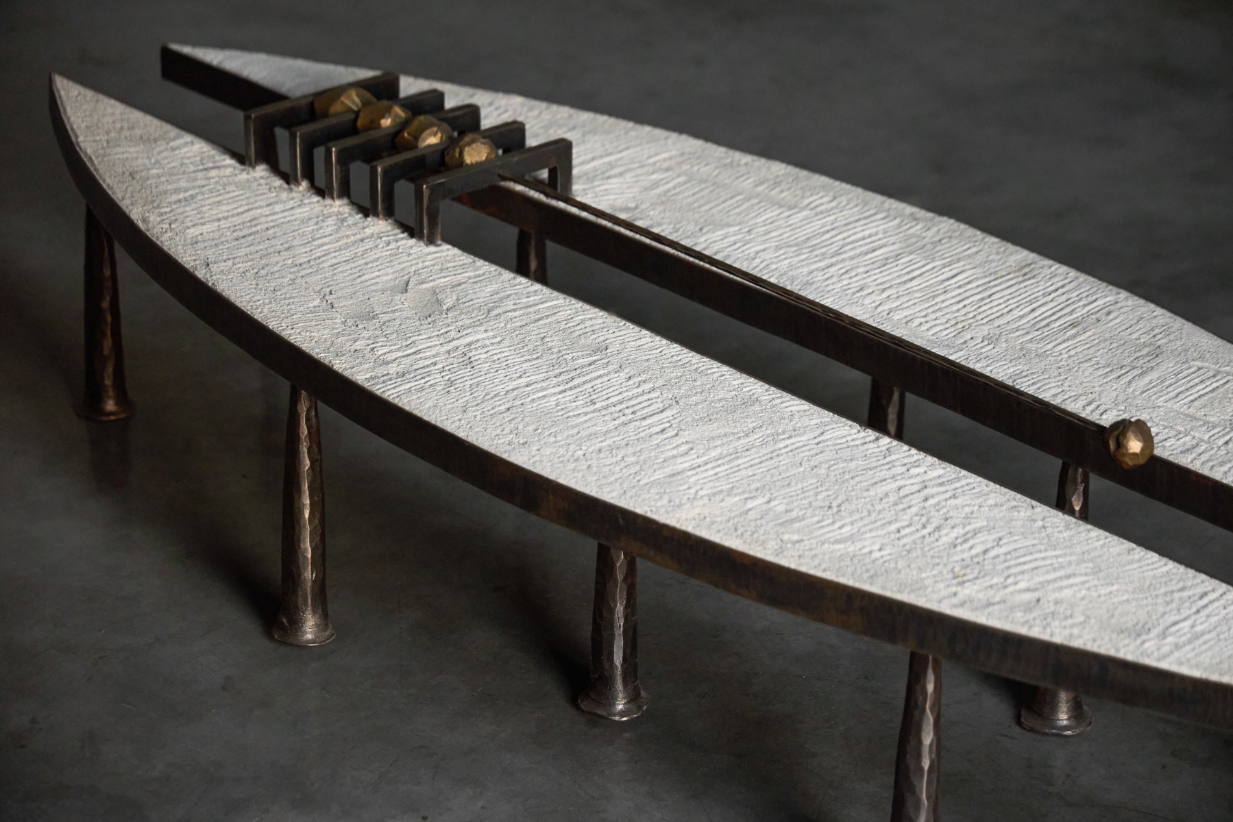 Contemporary brutalist coffee table by Thomas Serruys using steel and stone