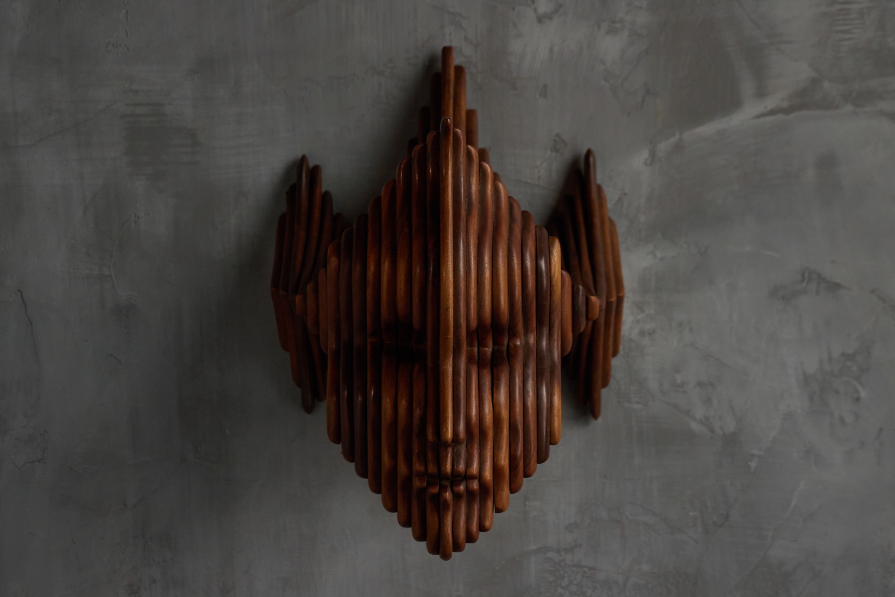 French carved wooden mask wall panel in sculptural form