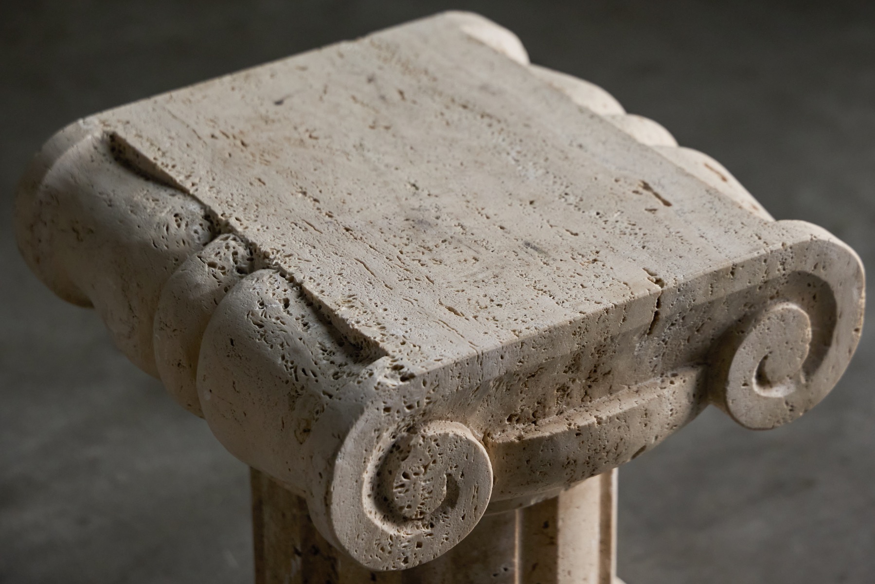 Italian travertine side table in the form of an Ionic column pedestal