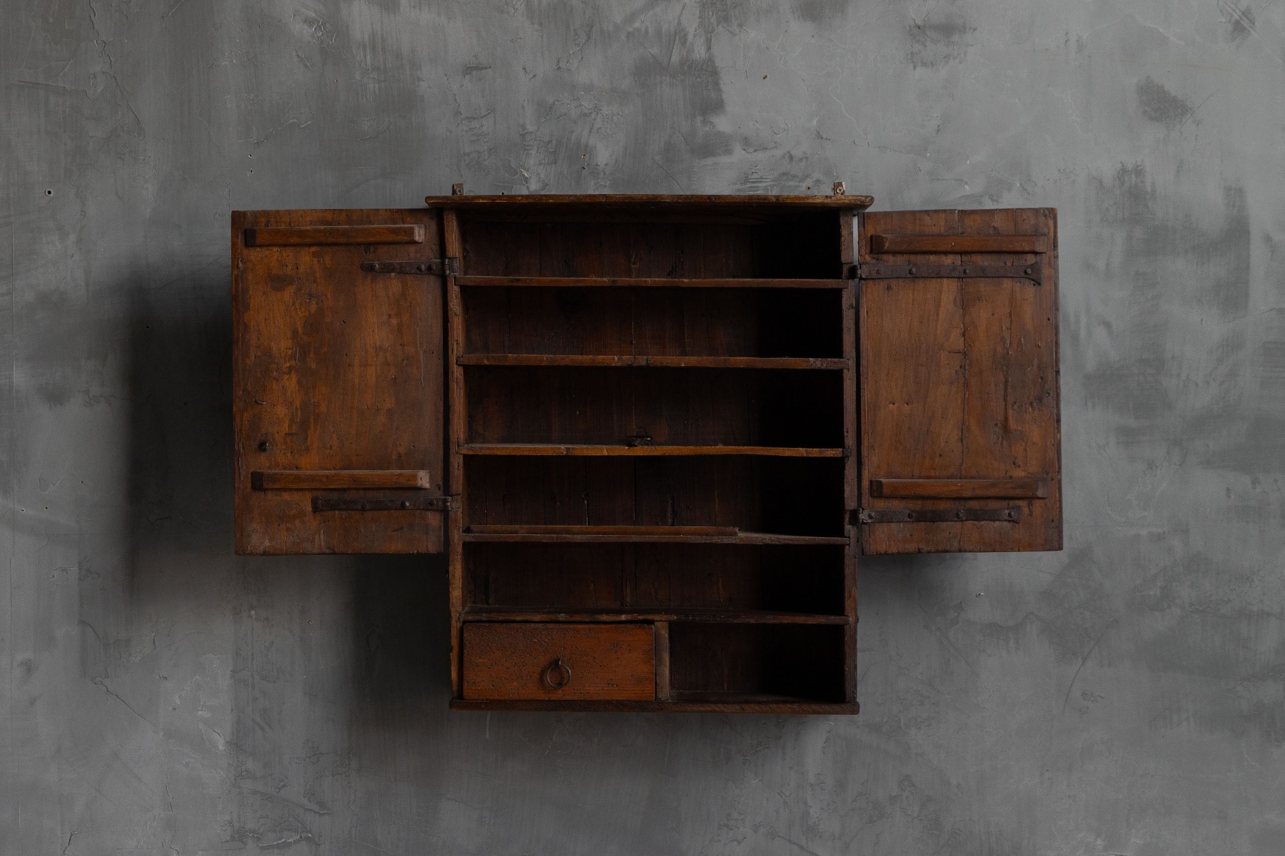 Late 19th century vernacular wall cabinet in solid wood
