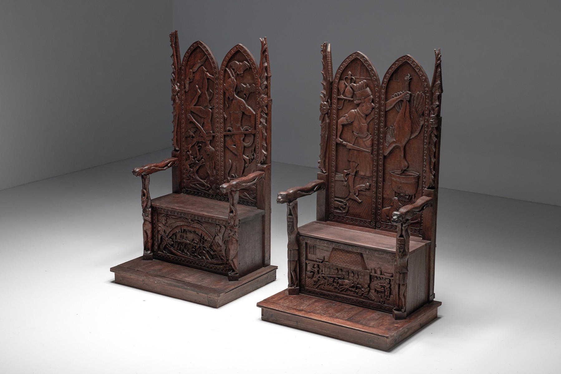 Ornate carved throne chair in wood with relief design