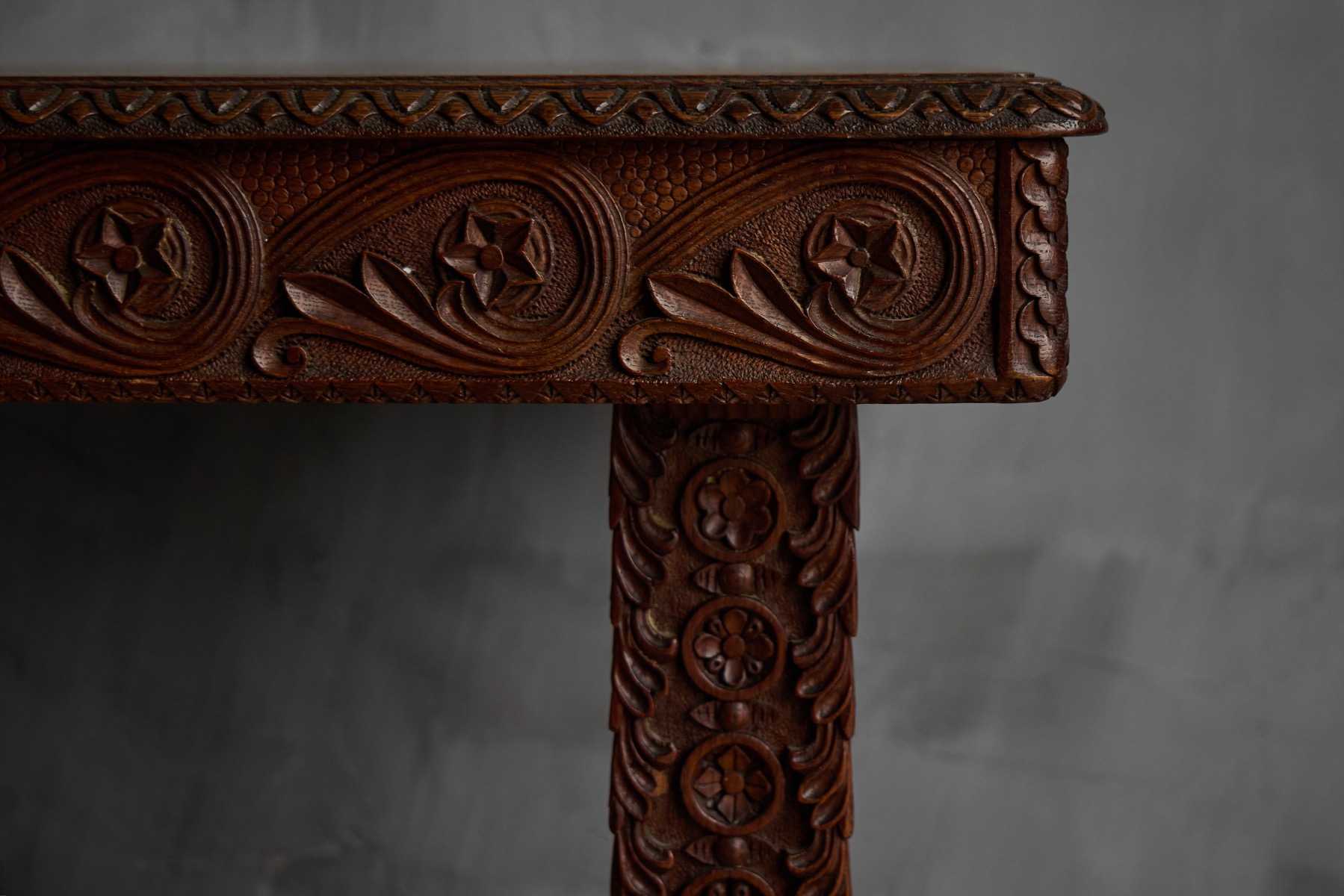 Late 19th century ornate console table with rich carved wood decoration