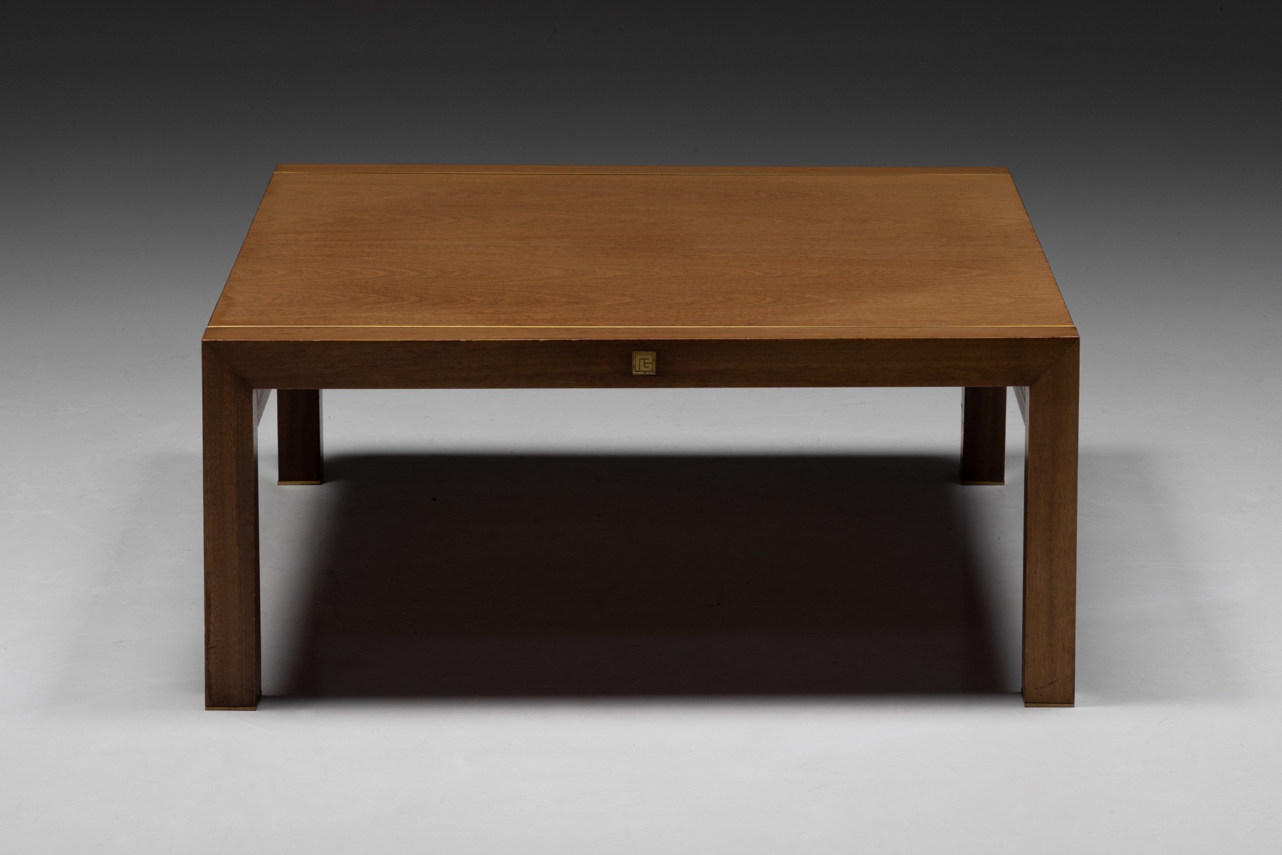 Pierre Balmain coffee table in walnut and brass design