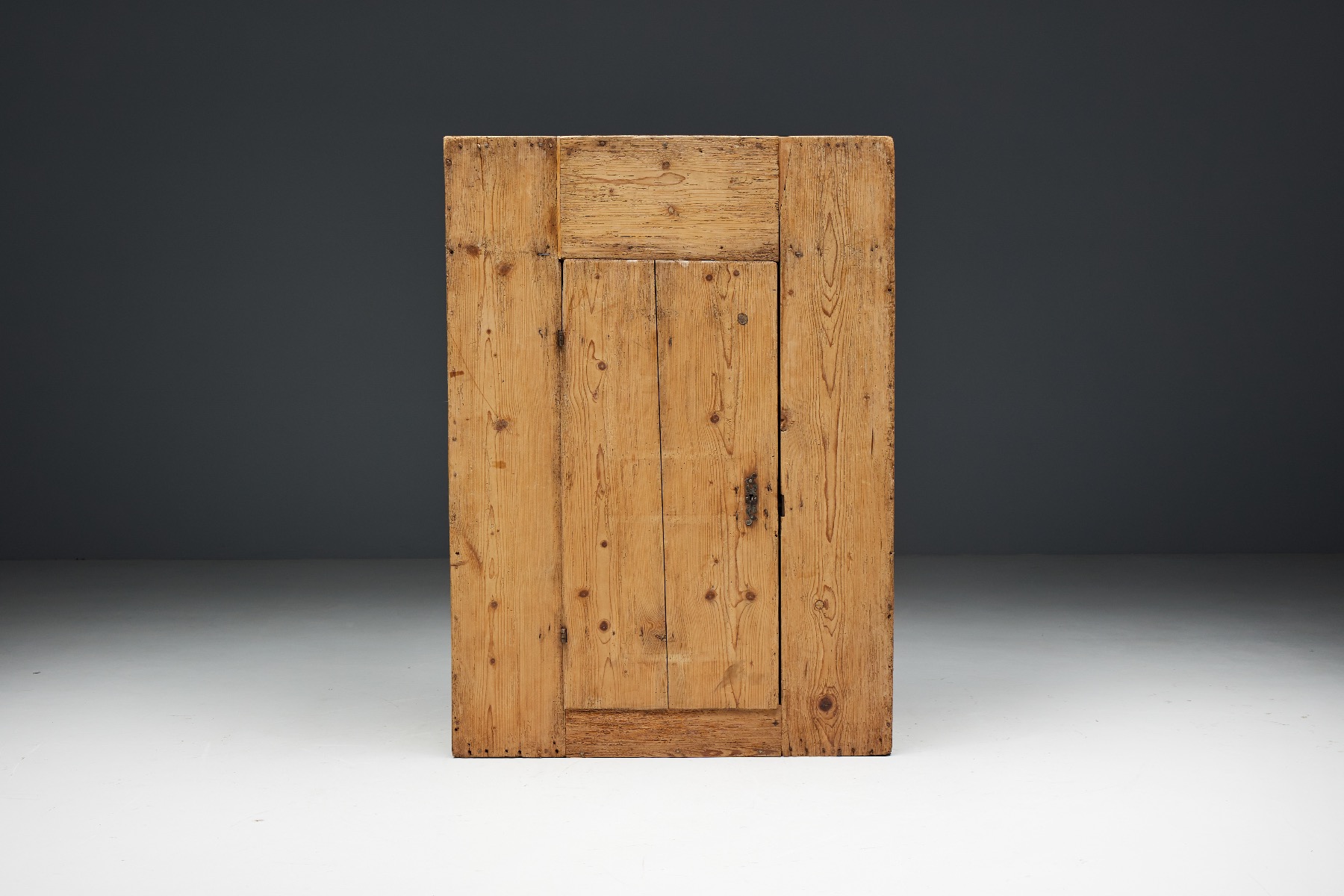 Primitive brutalist wooden cabinet in naive folk style