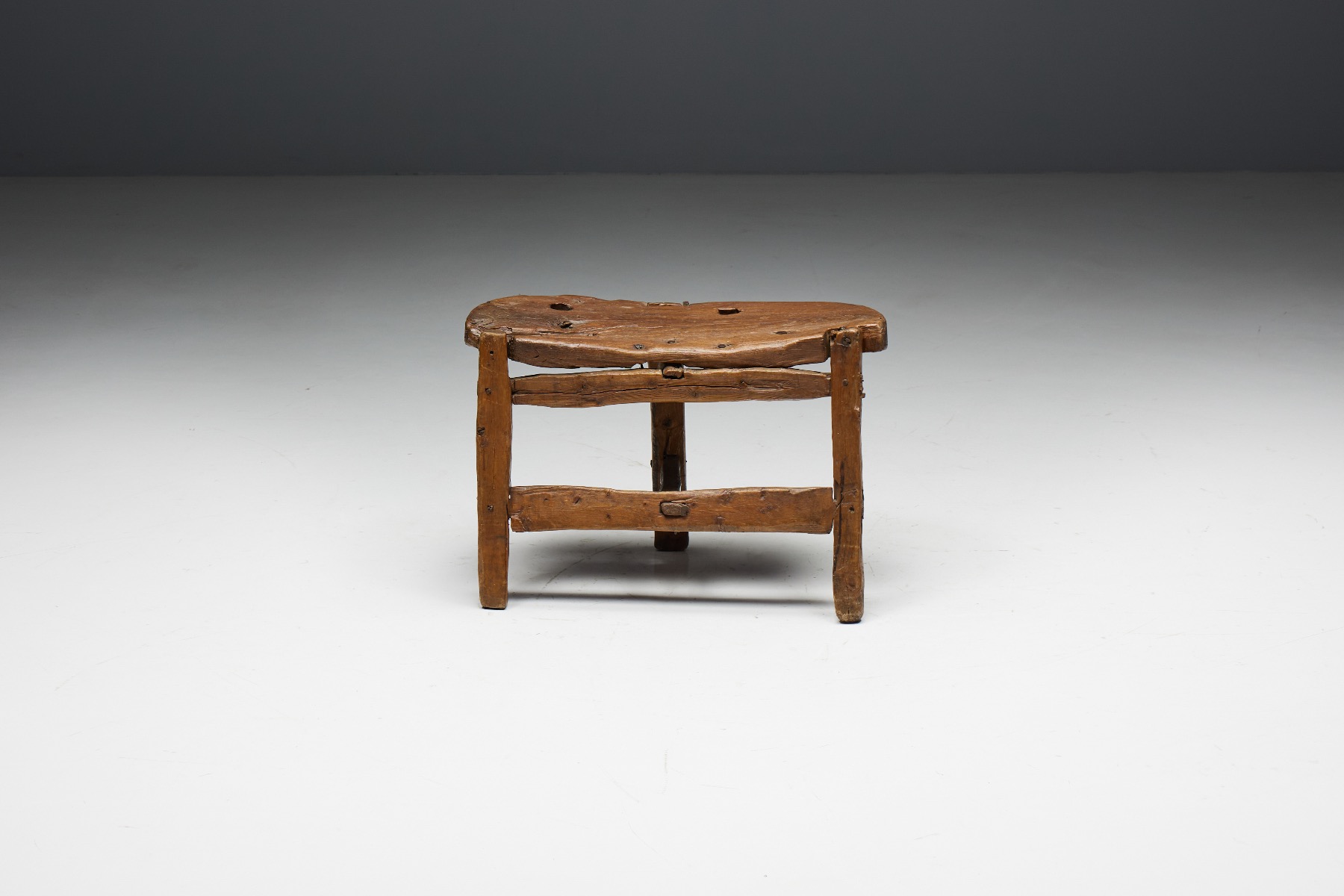 Primitive tripod wooden bench handcrafted in solid wood