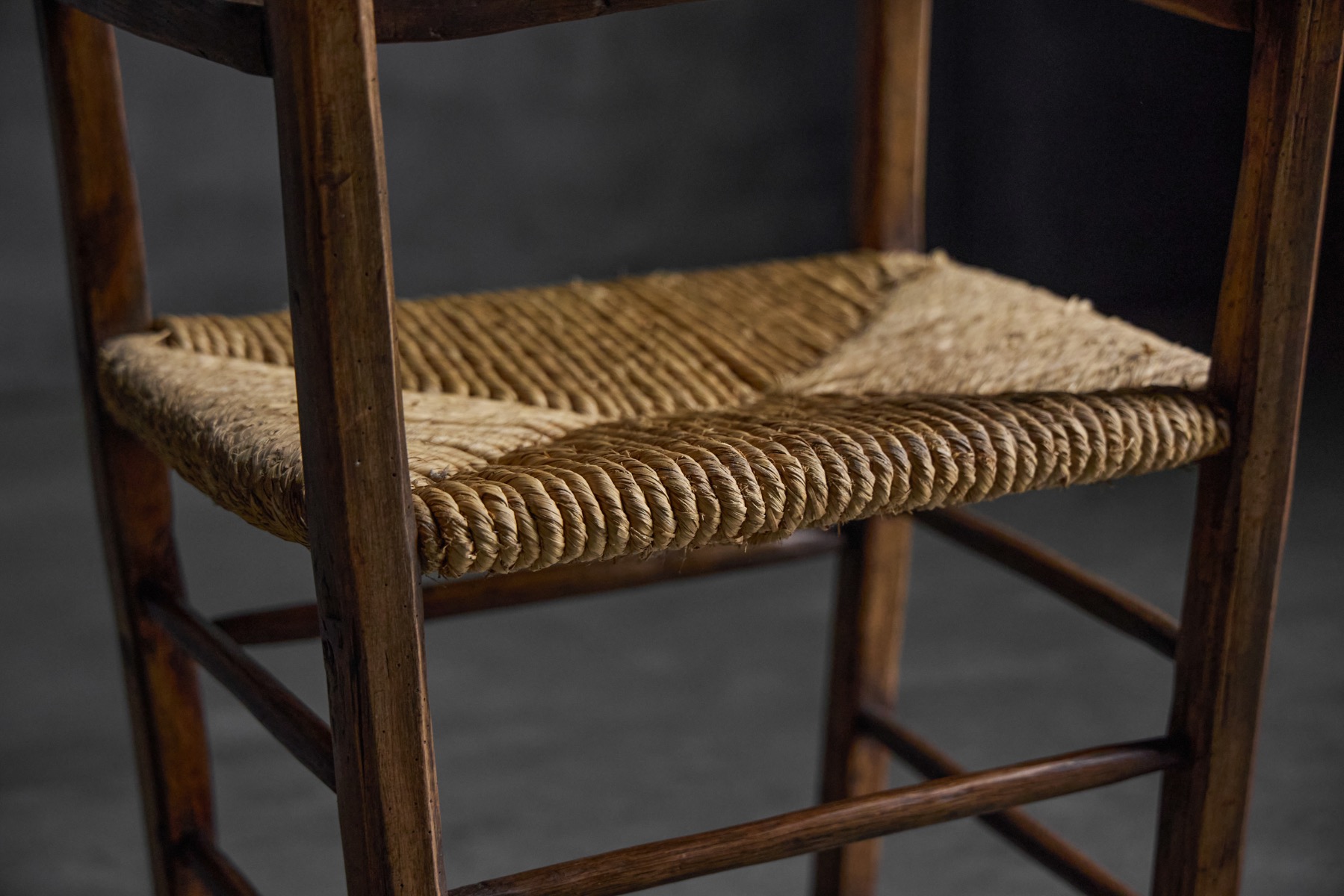 Early 20th century rural armchair with vernacular wooden construction