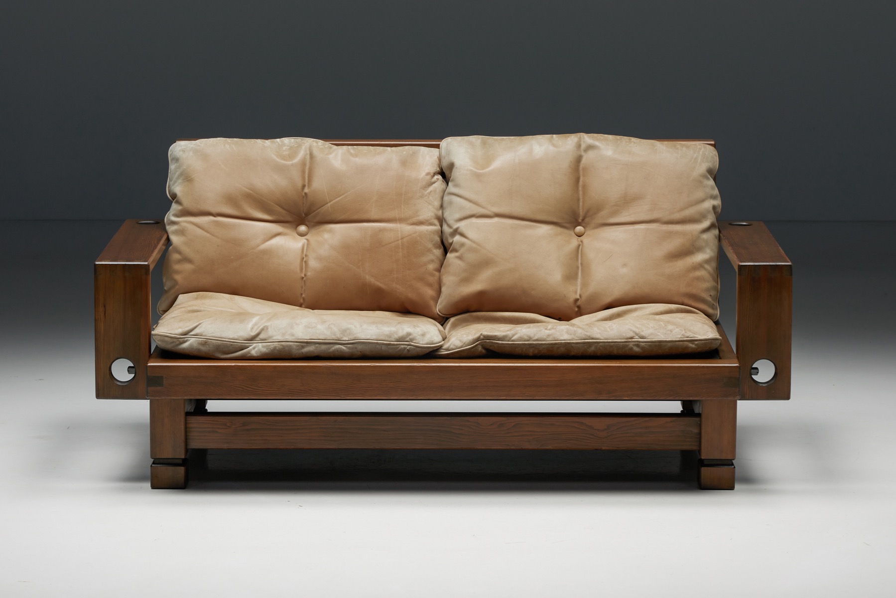 Vintage French two seater in wood with leather cushions from the 1960s