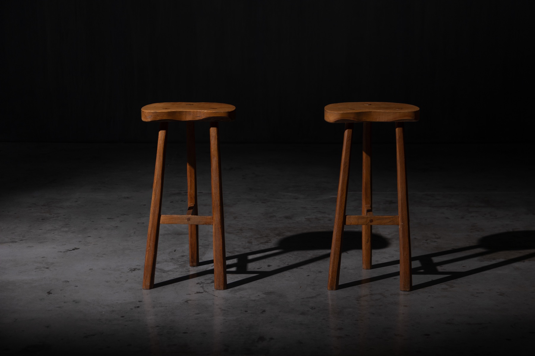 Vintage 1950s wooden bar stools with sturdy construction