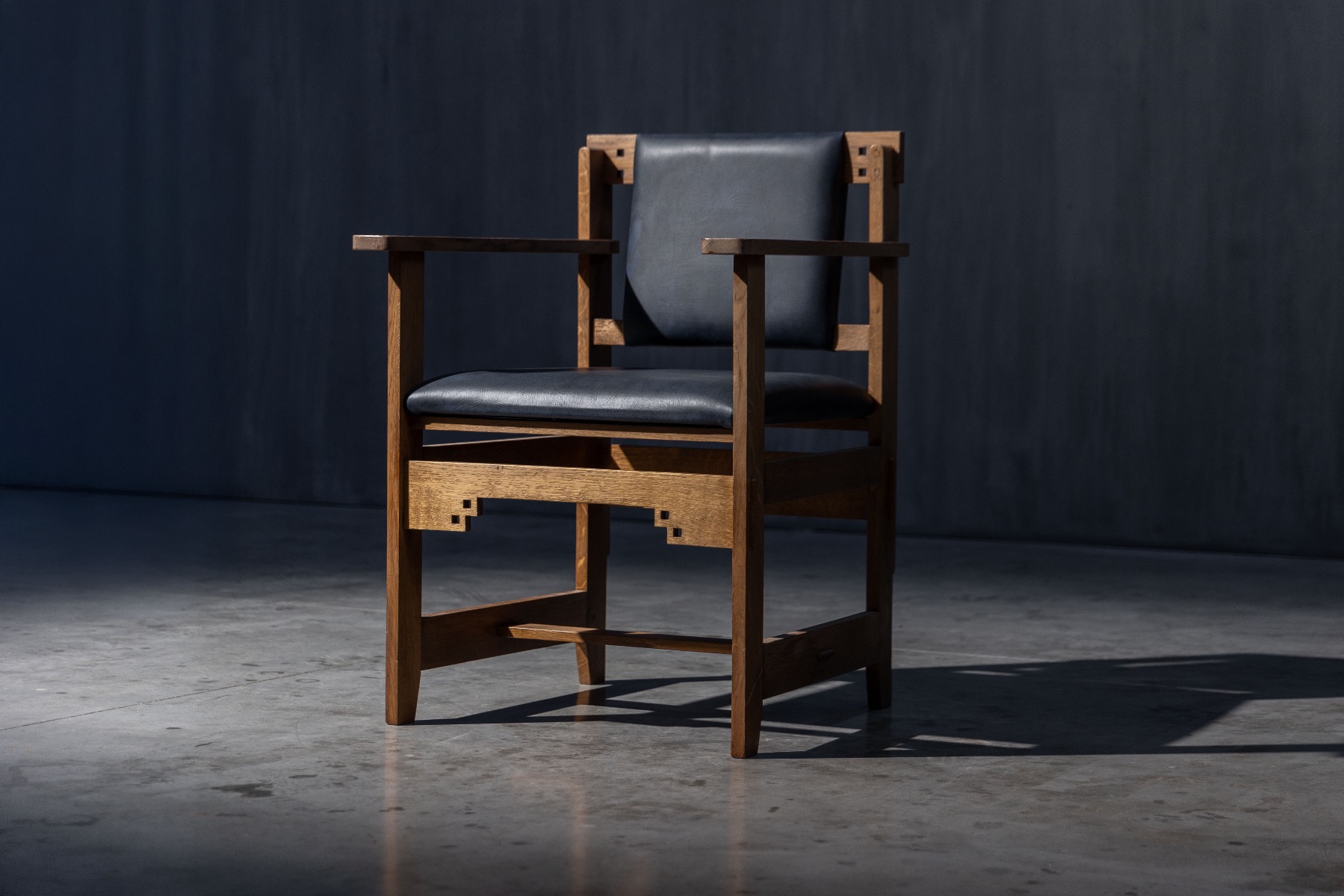 Vintage Art Deco armchair with geometric detailing