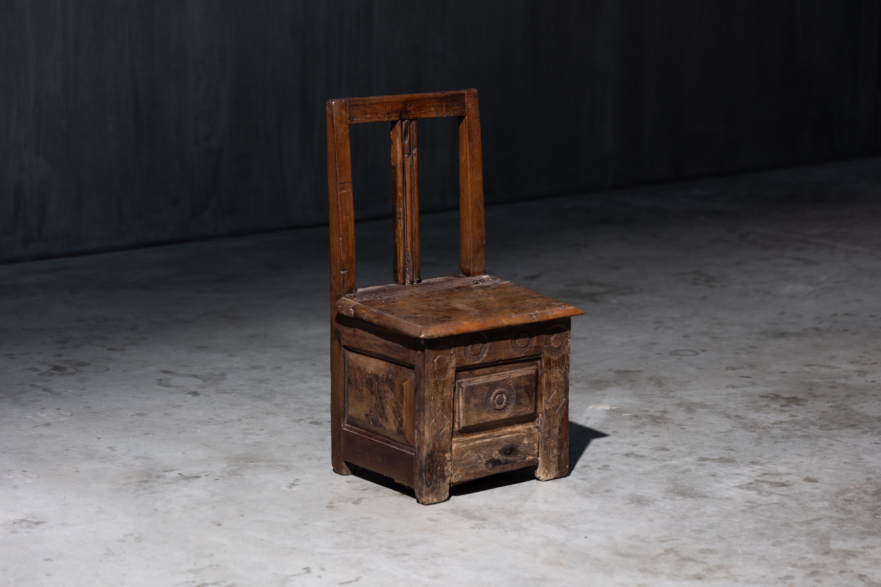 19th century rustic seat with hidden storage compartment
