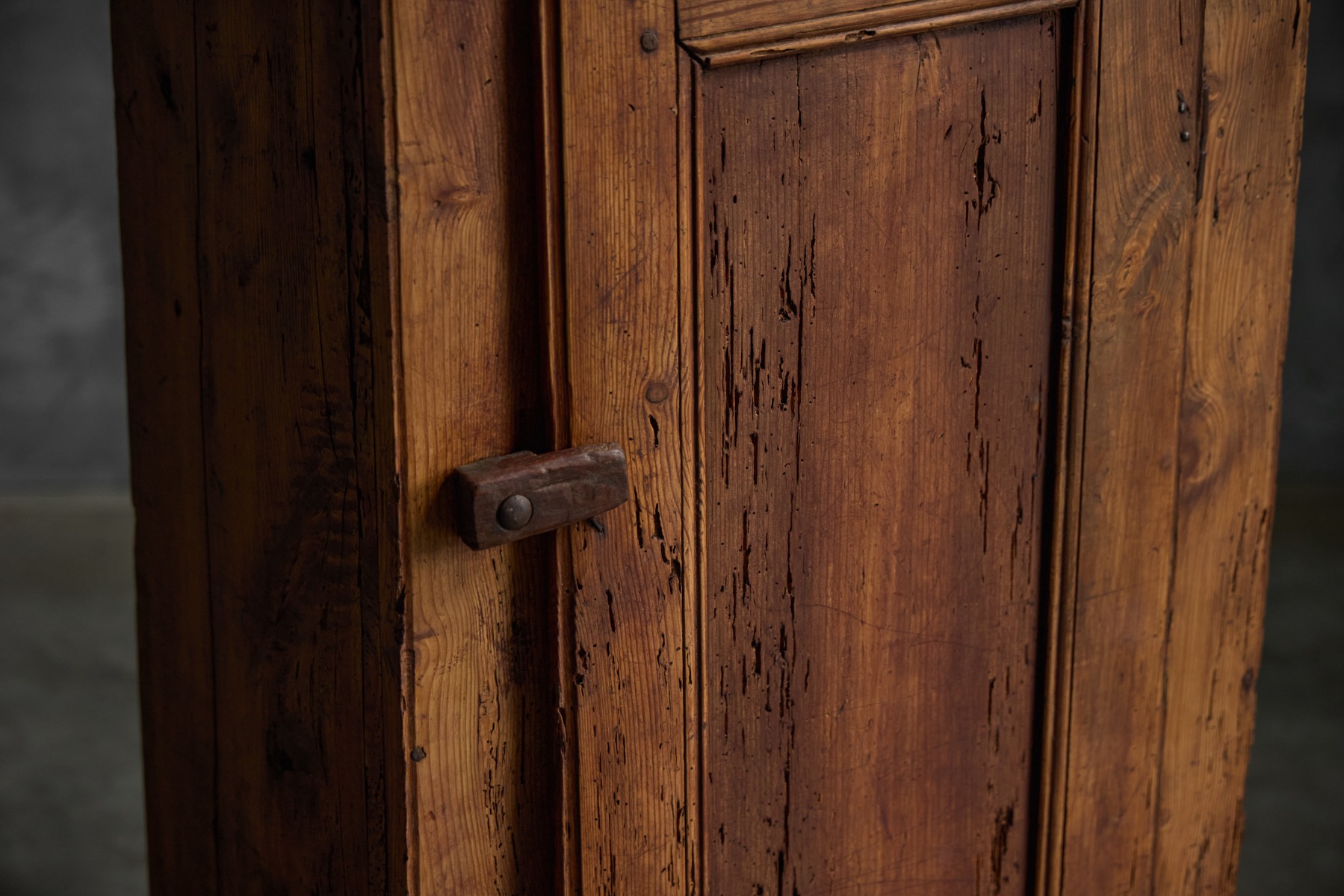 Antique rural Alpine cupboard with natural aged patina
