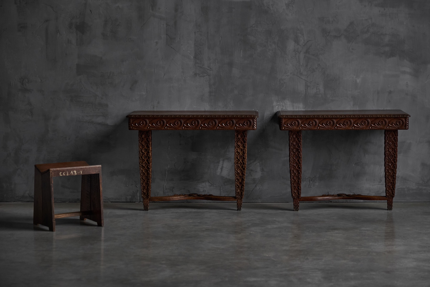 Antique wooden console table with detailed hand carved ornamentation