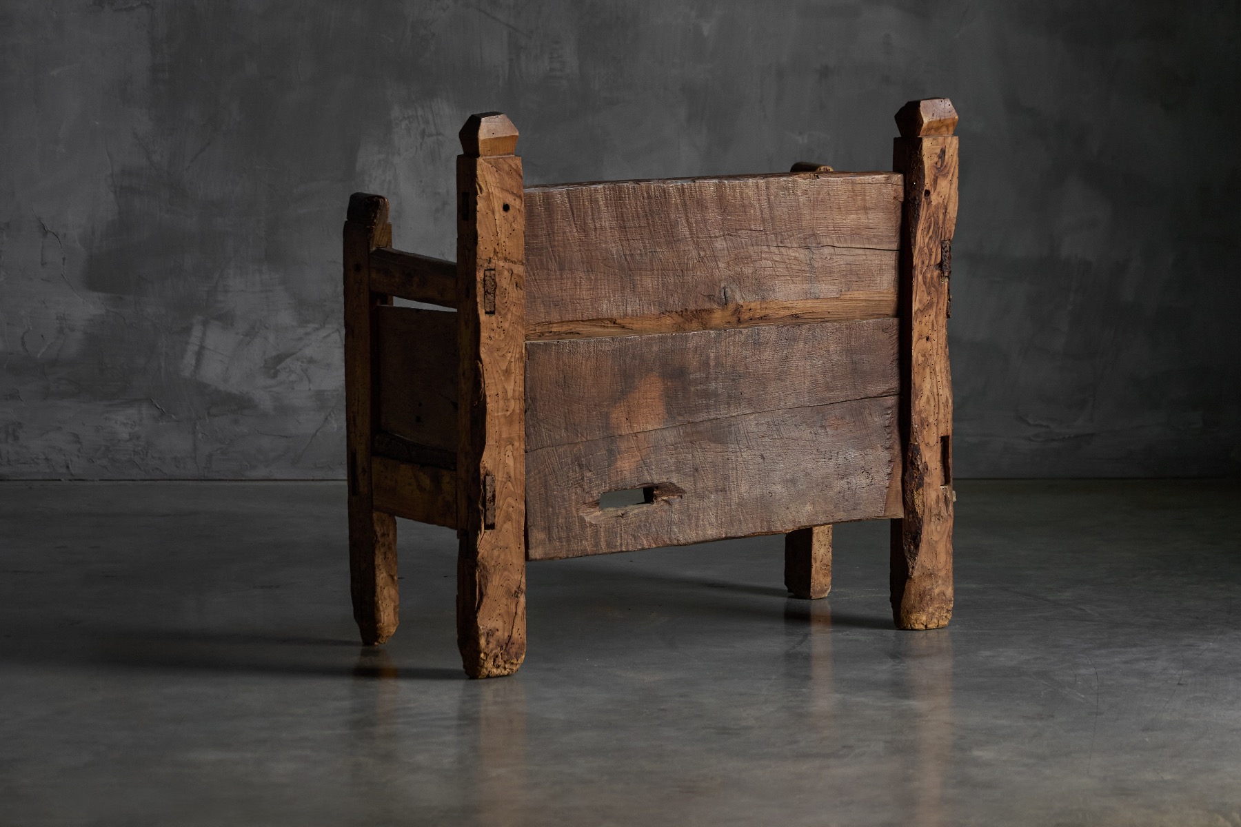 Antique primitive bench with robust utilitarian character