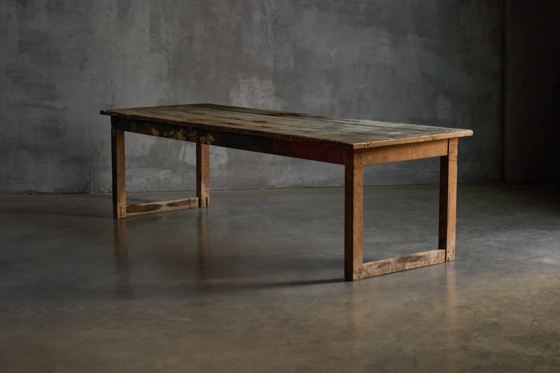 Antique rustic dining table with primitive construction