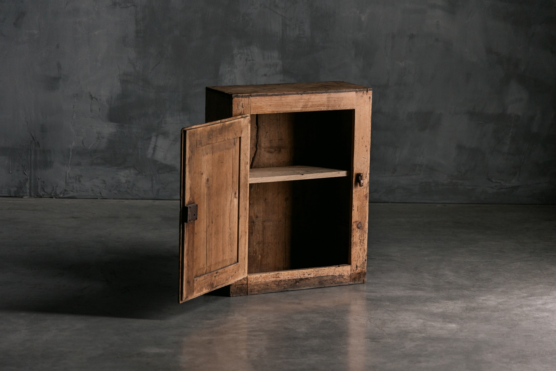 Antique farmhouse cupboard crafted in wood