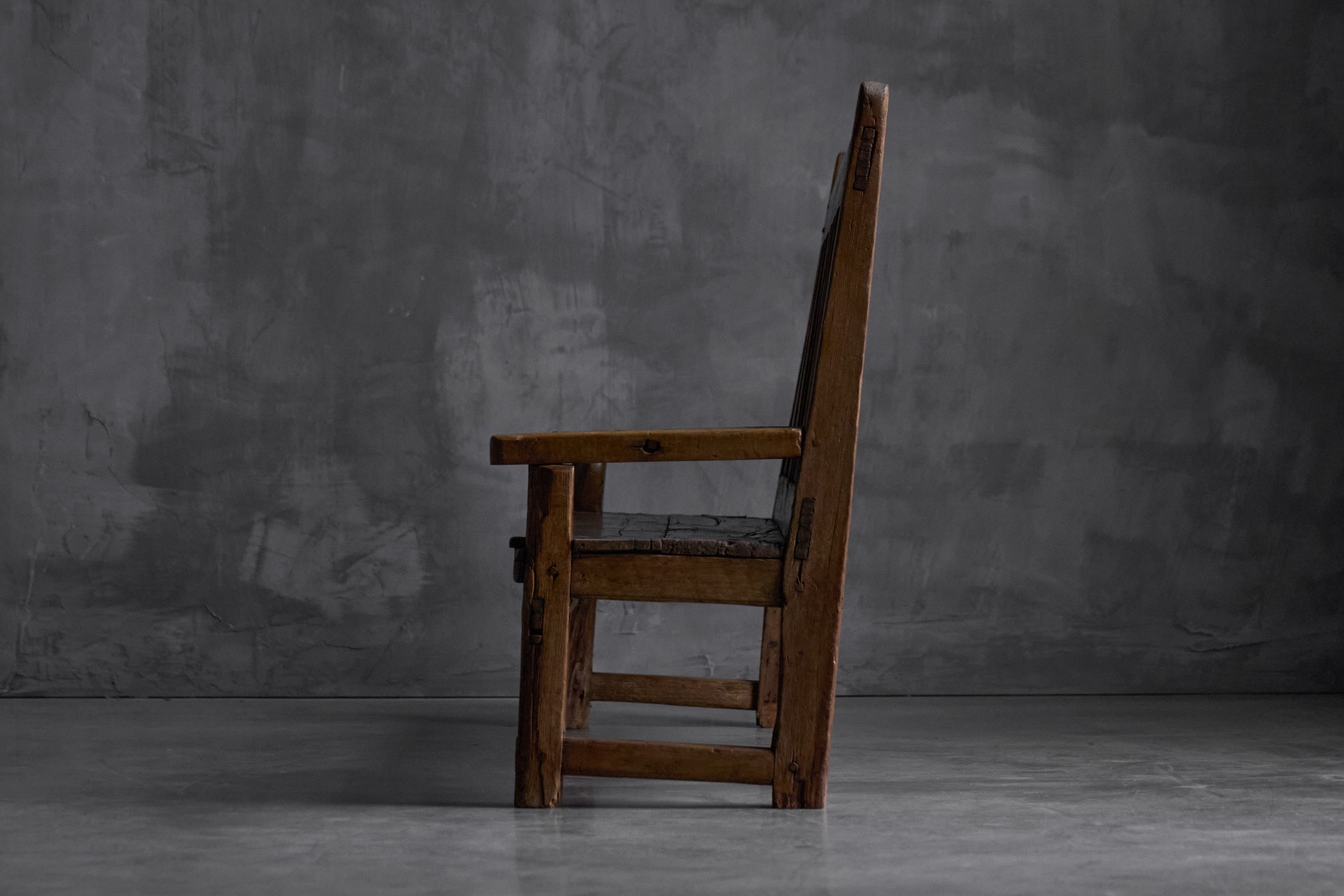 Antique wooden travail populaire bench with natural aged patina
