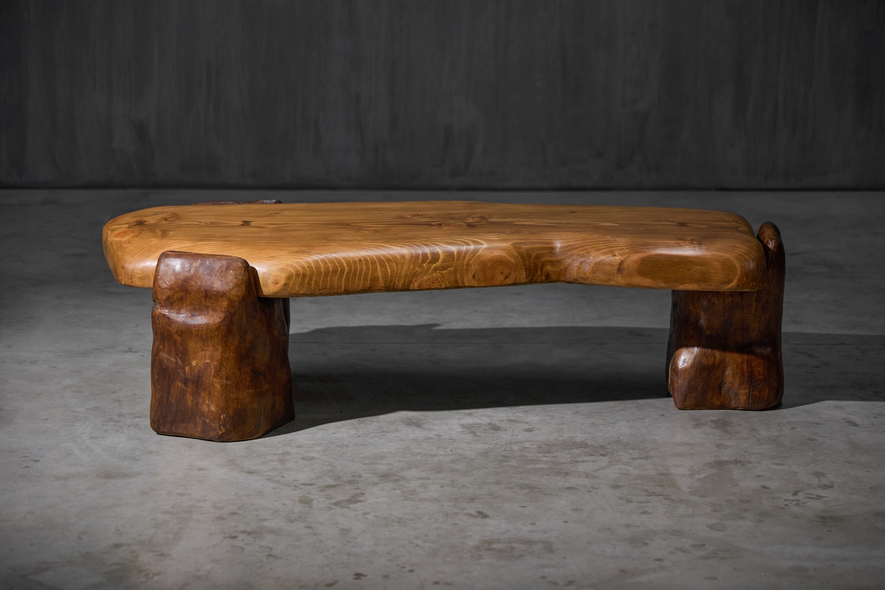 Artisan crafted brutalist coffee table with carved surface
