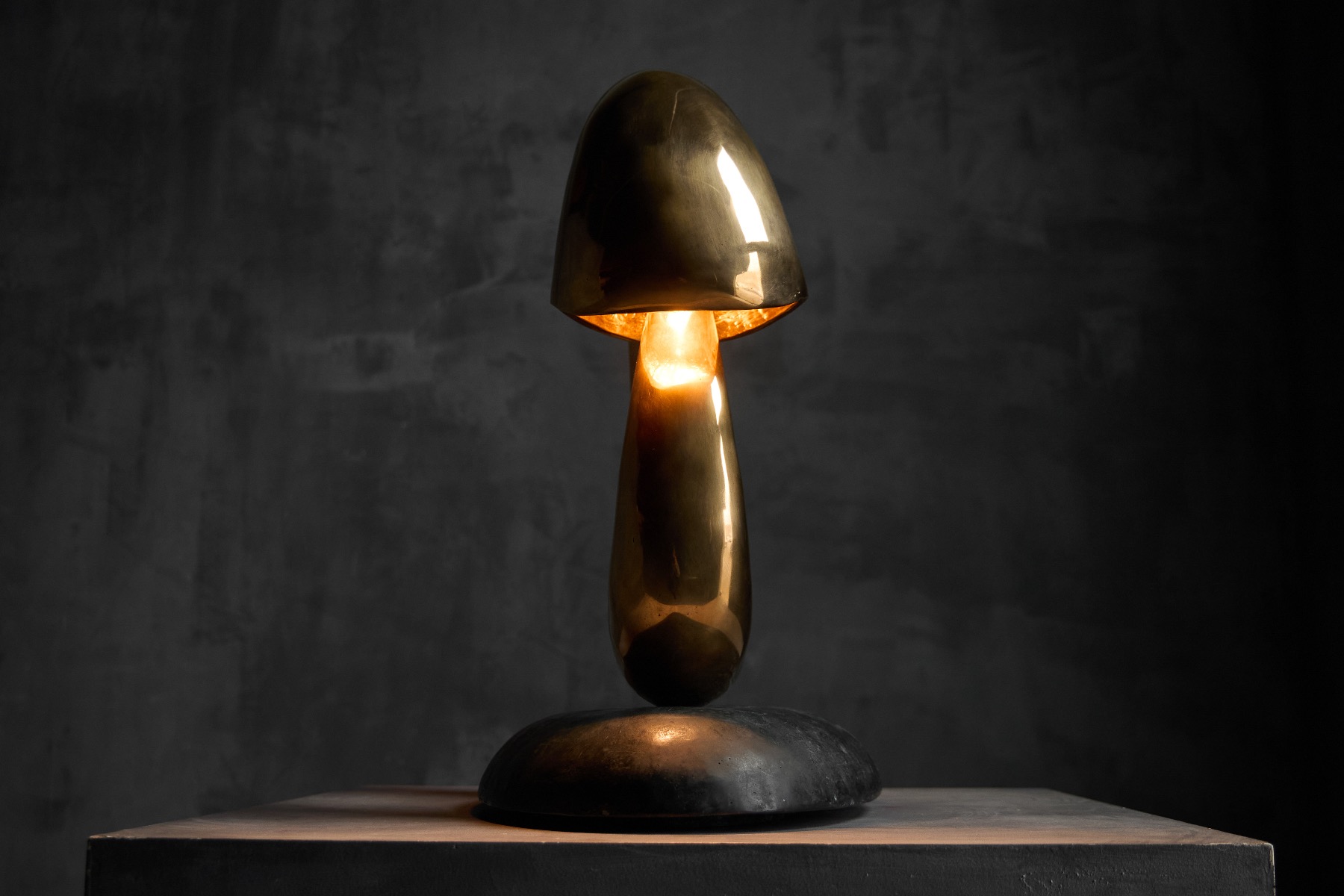 Figurative bronze light sculpture titled Angler, 2019