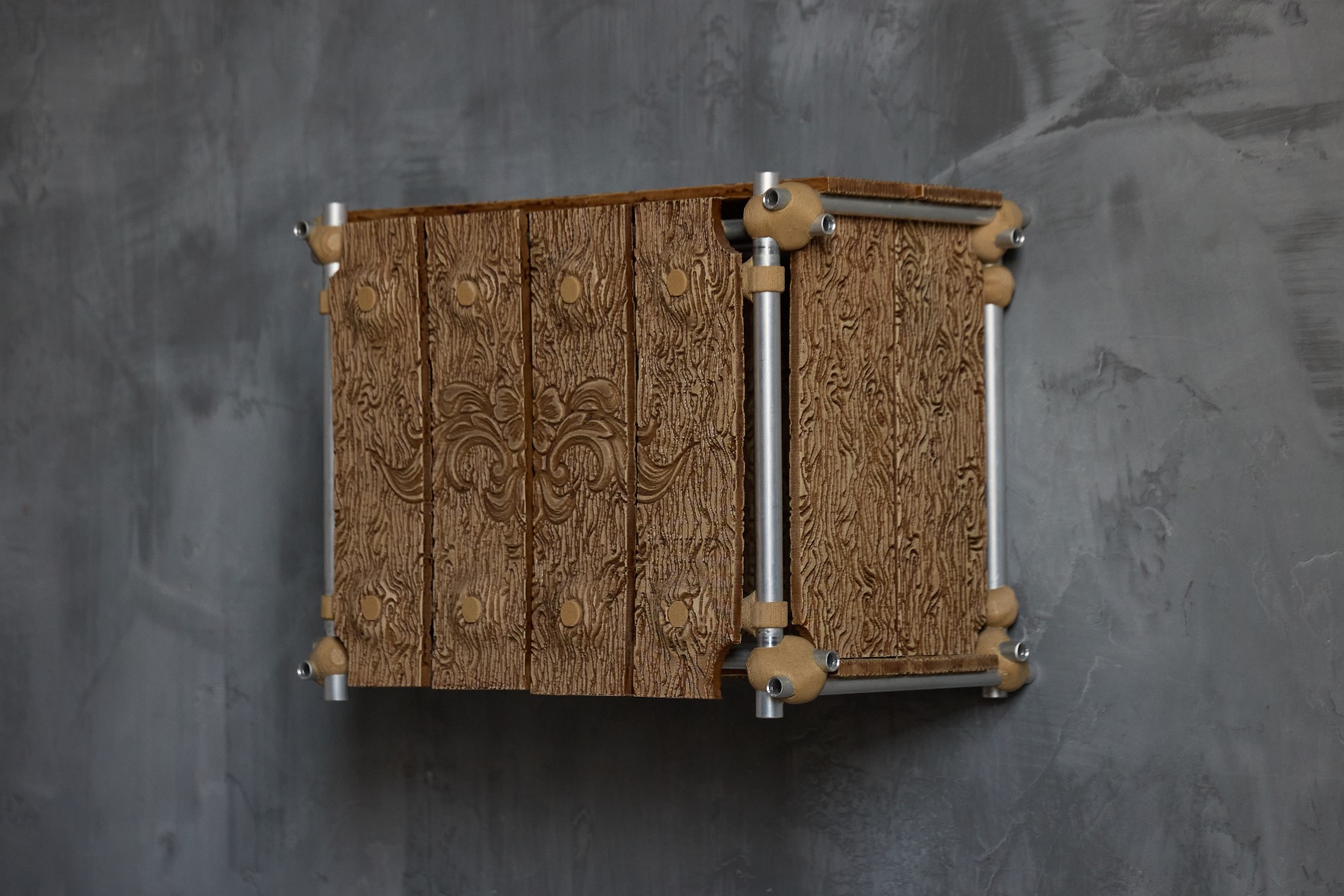 Sculptural rosewood cabinet with architectural design language