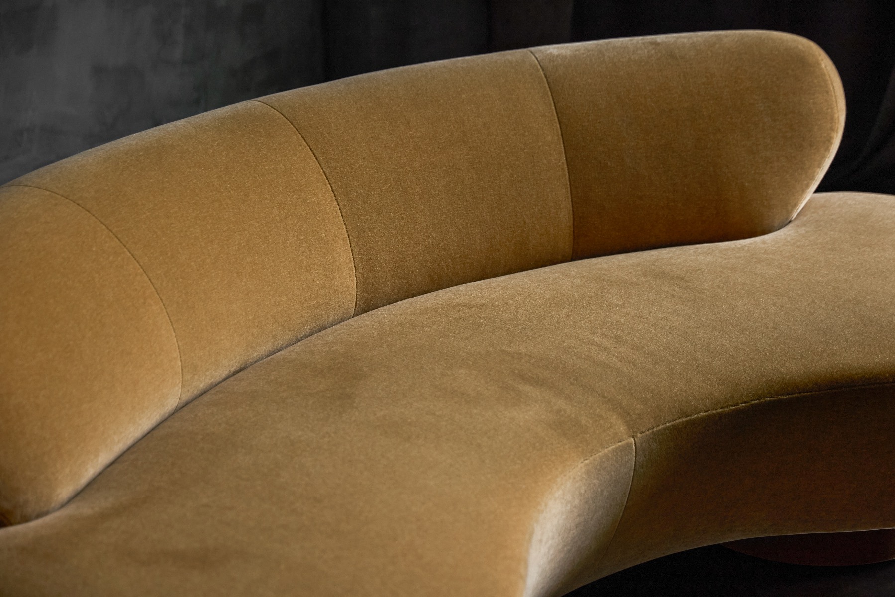 Sculptural Serpentine sofa with flowing modernist form