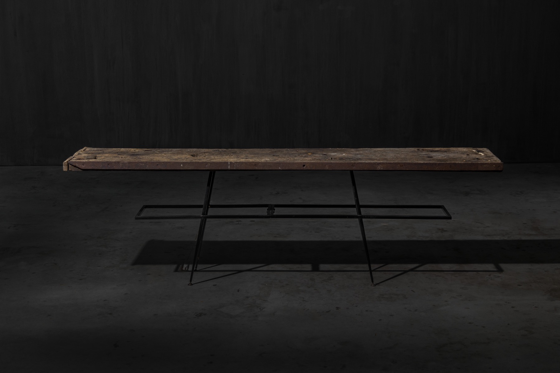 Rustic industrial console table with raw materials
