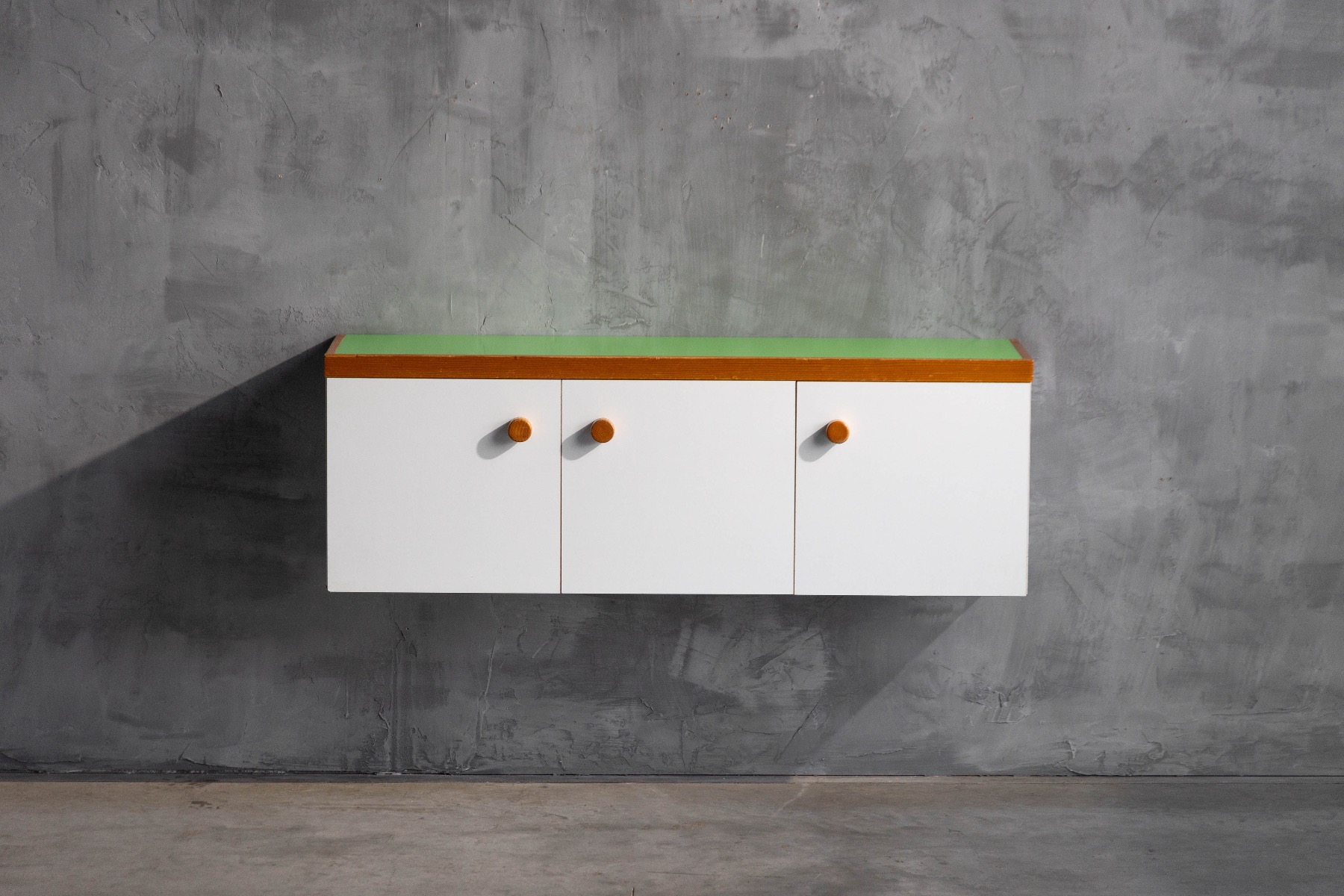Wall mounted storage cabinet designed for Les Arcs by Charlotte Perriand