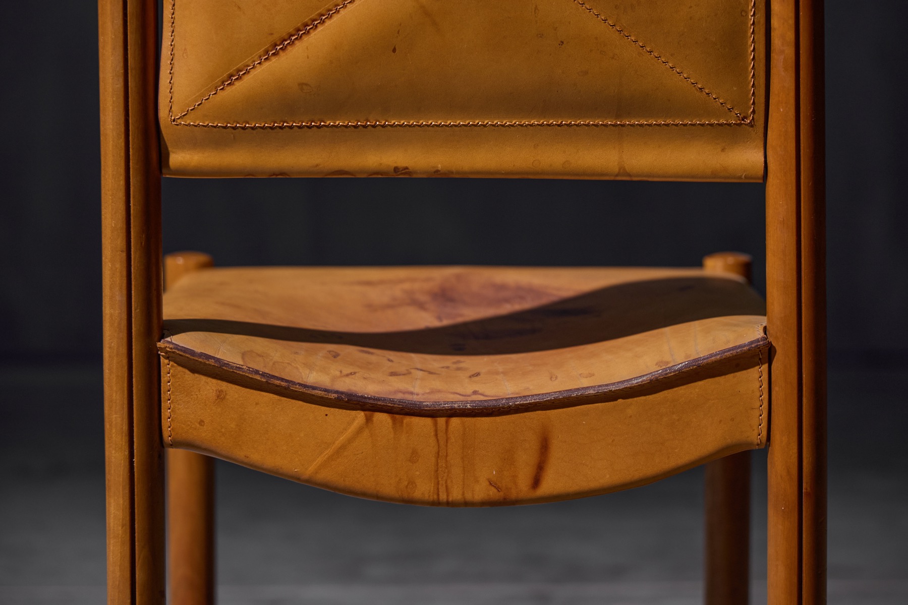 Mid century modern dining chairs in brown leather