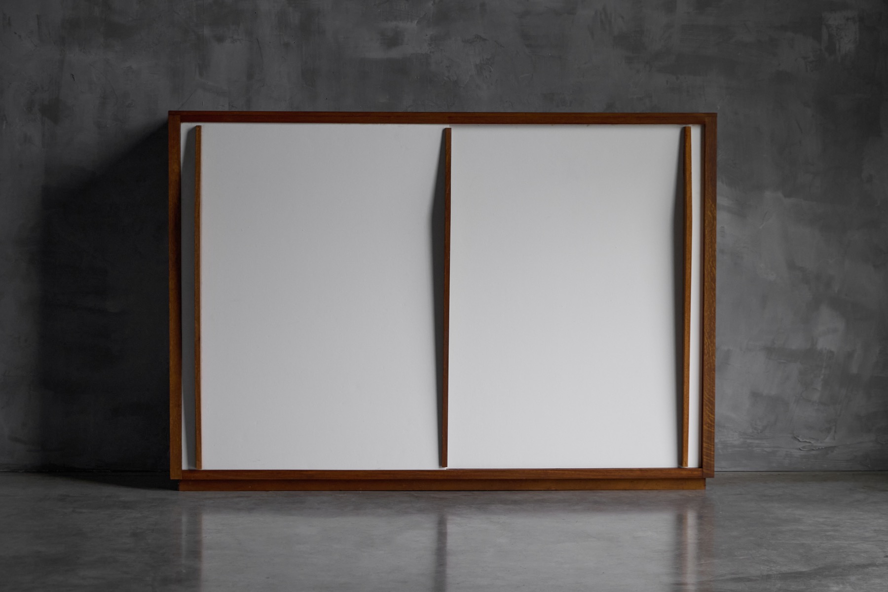 Mid century modern storage piece with sliding panels by Charlotte Perriand & Jean Prouvé