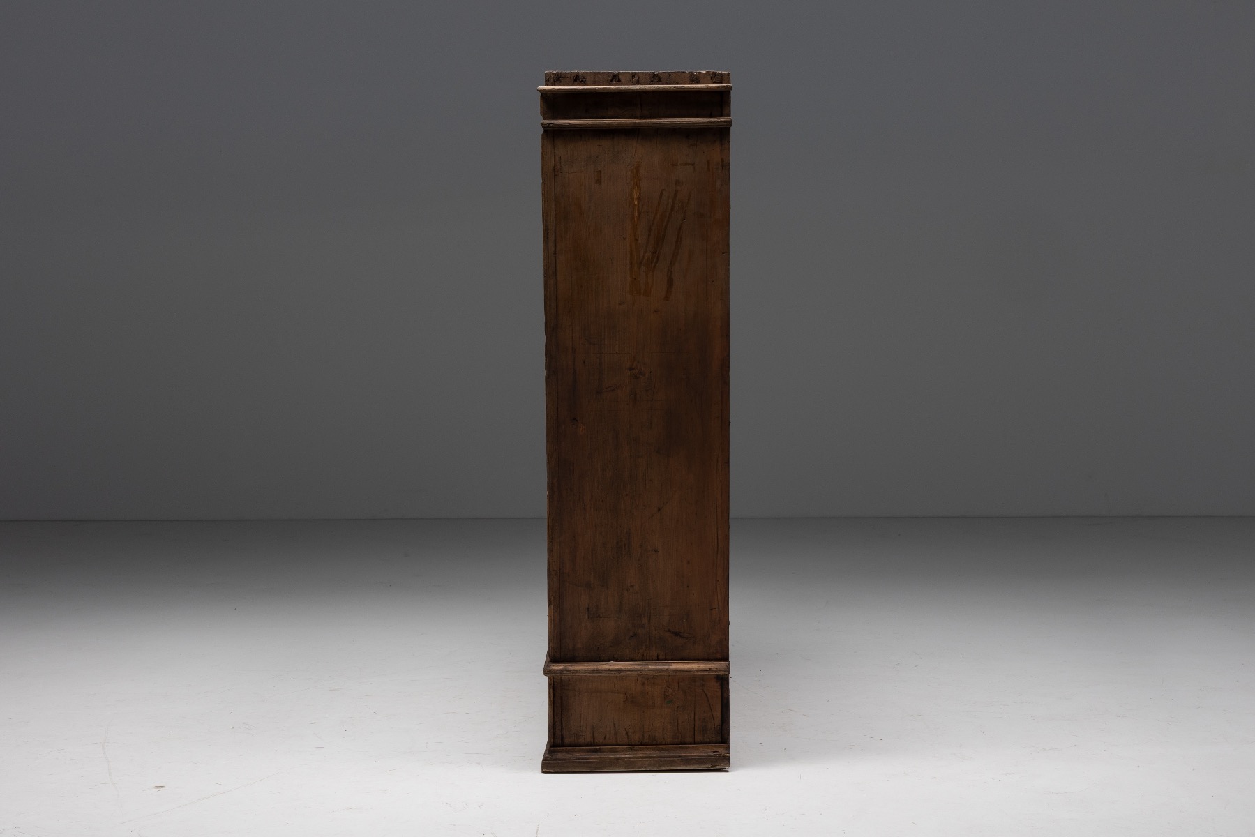 Primitive alpine wooden cabinet in folk style