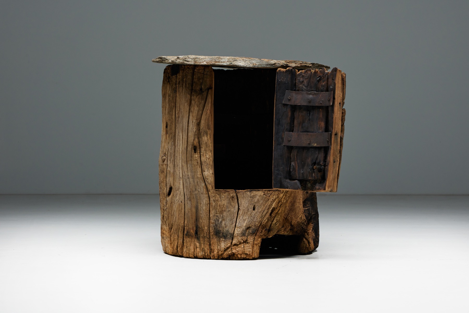 Primitive brutalist wooden stools in folk style