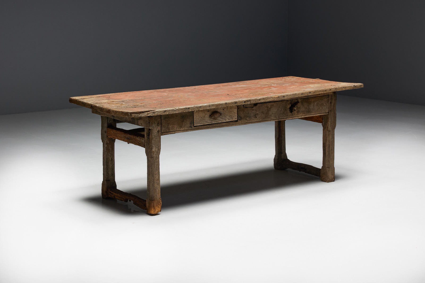 Primitive French dining table in travail populaire style