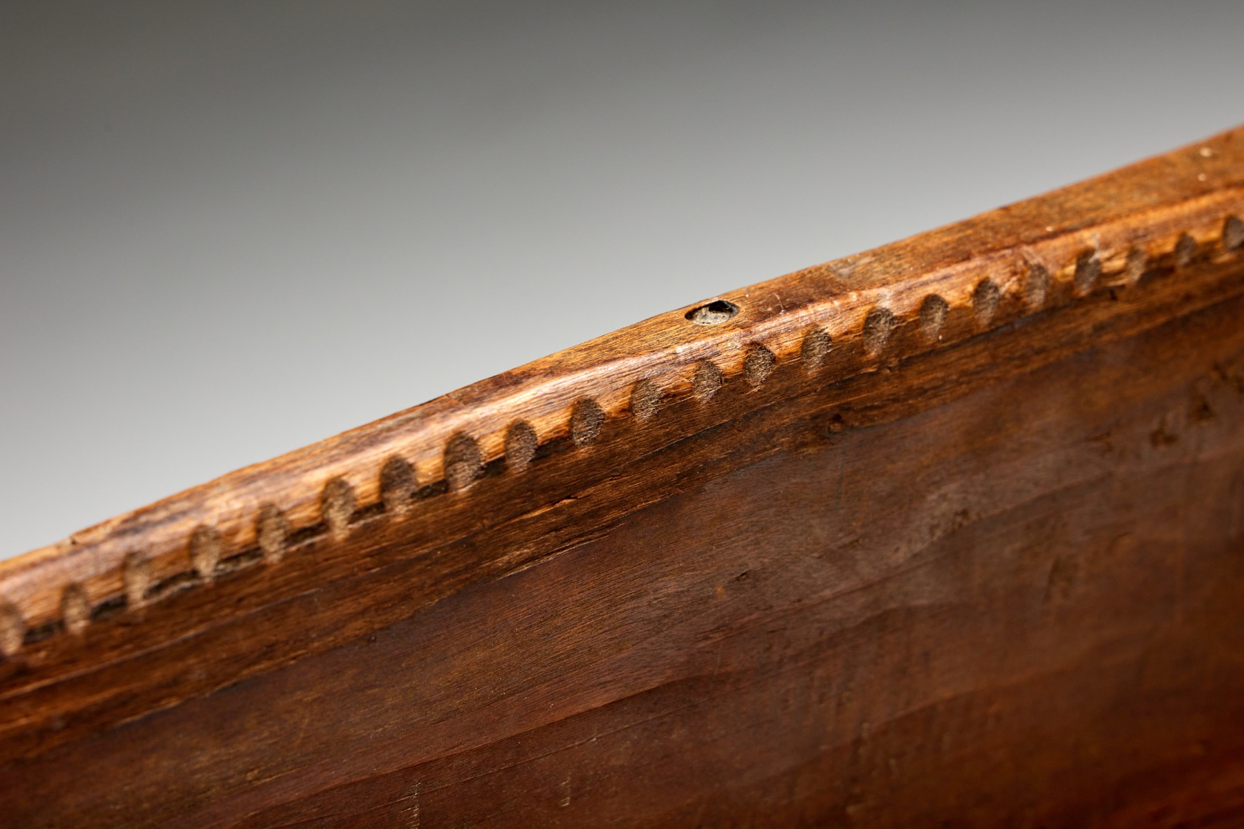Primitive Spanish wooden bench in folk style