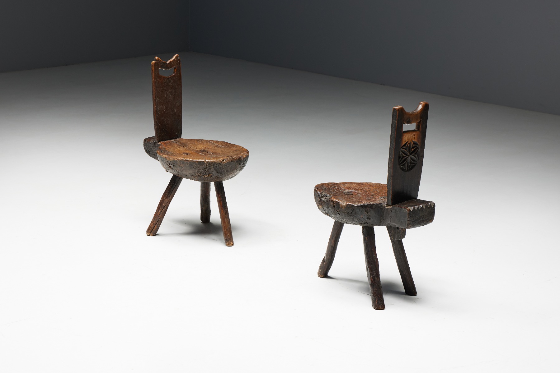 Primitive tripod chairs in wabi sabi style