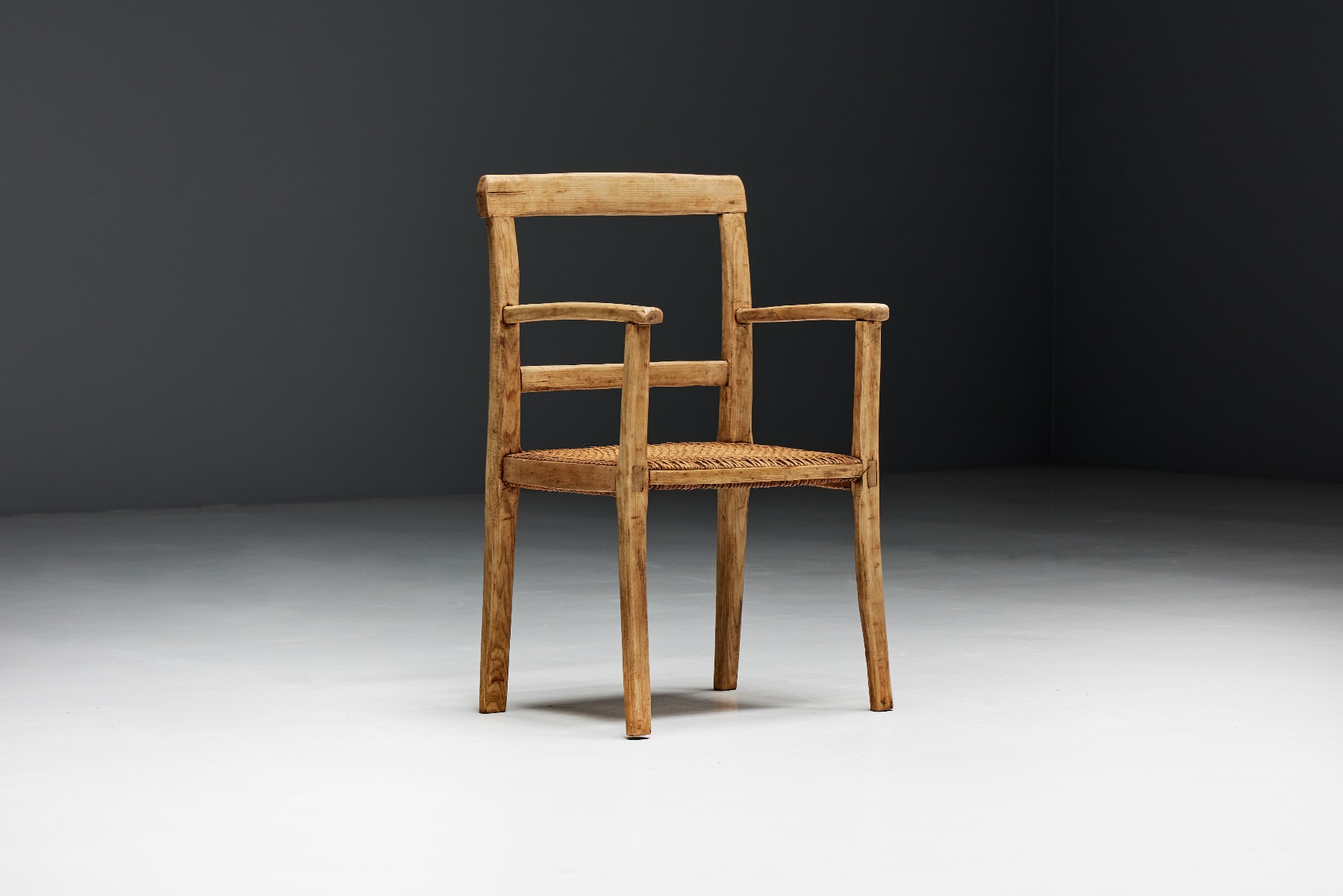 Primitive wood armchair in wabi style