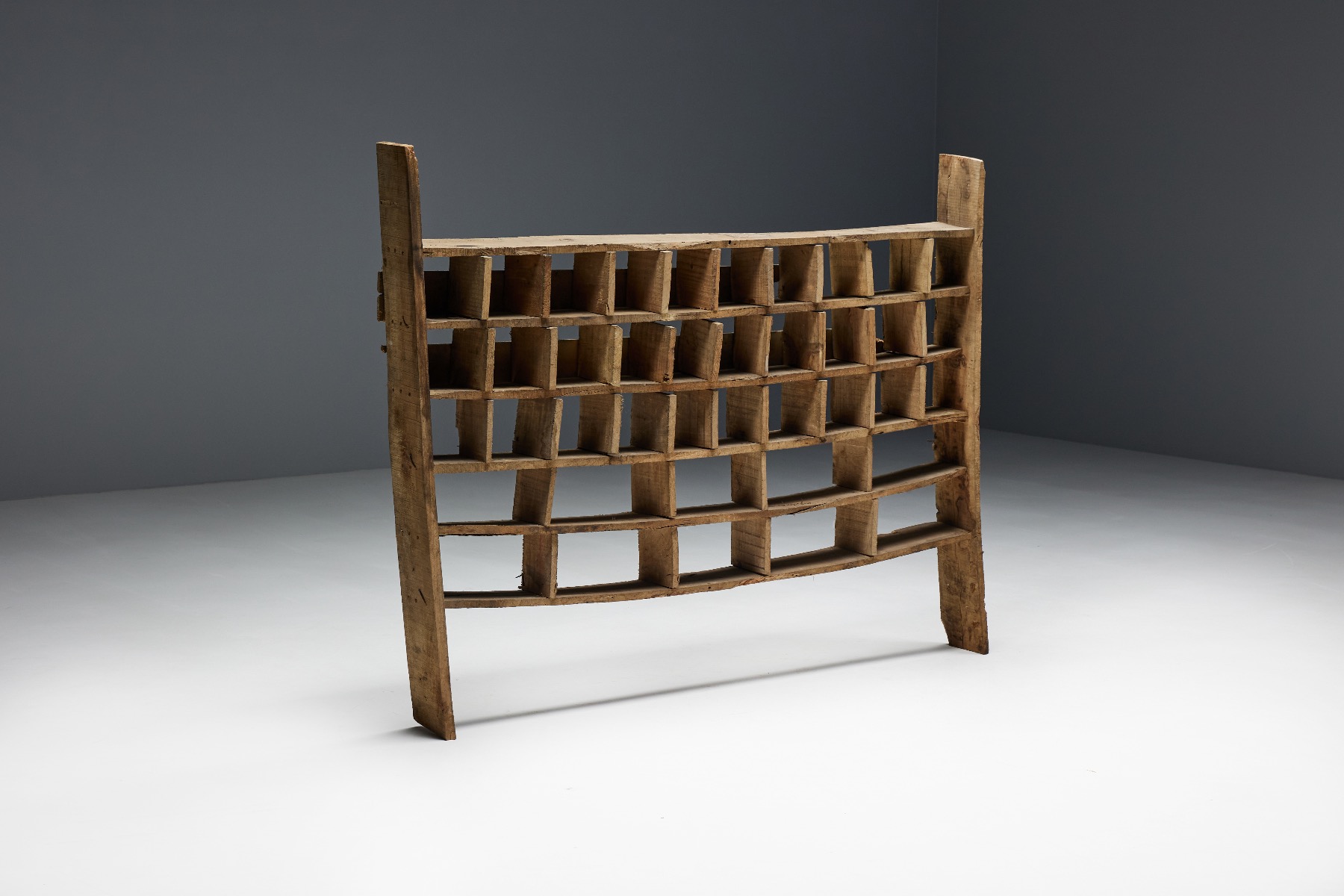 Primitive wood shelving unit in wabi style