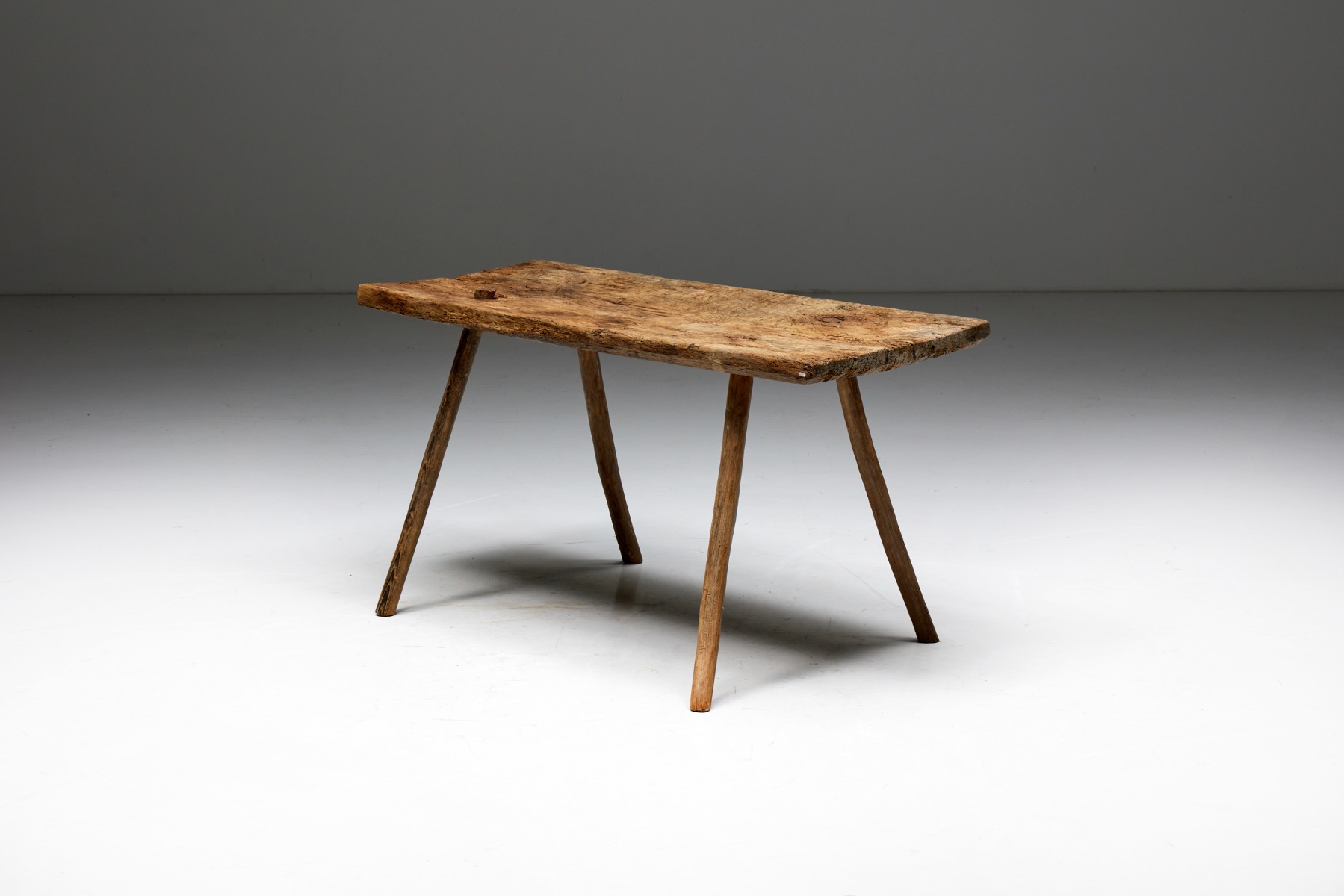 Primitive wood side table in wabi style