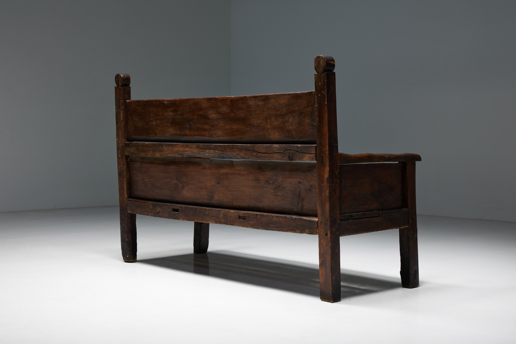 Primitive wooden bench in art populaire style