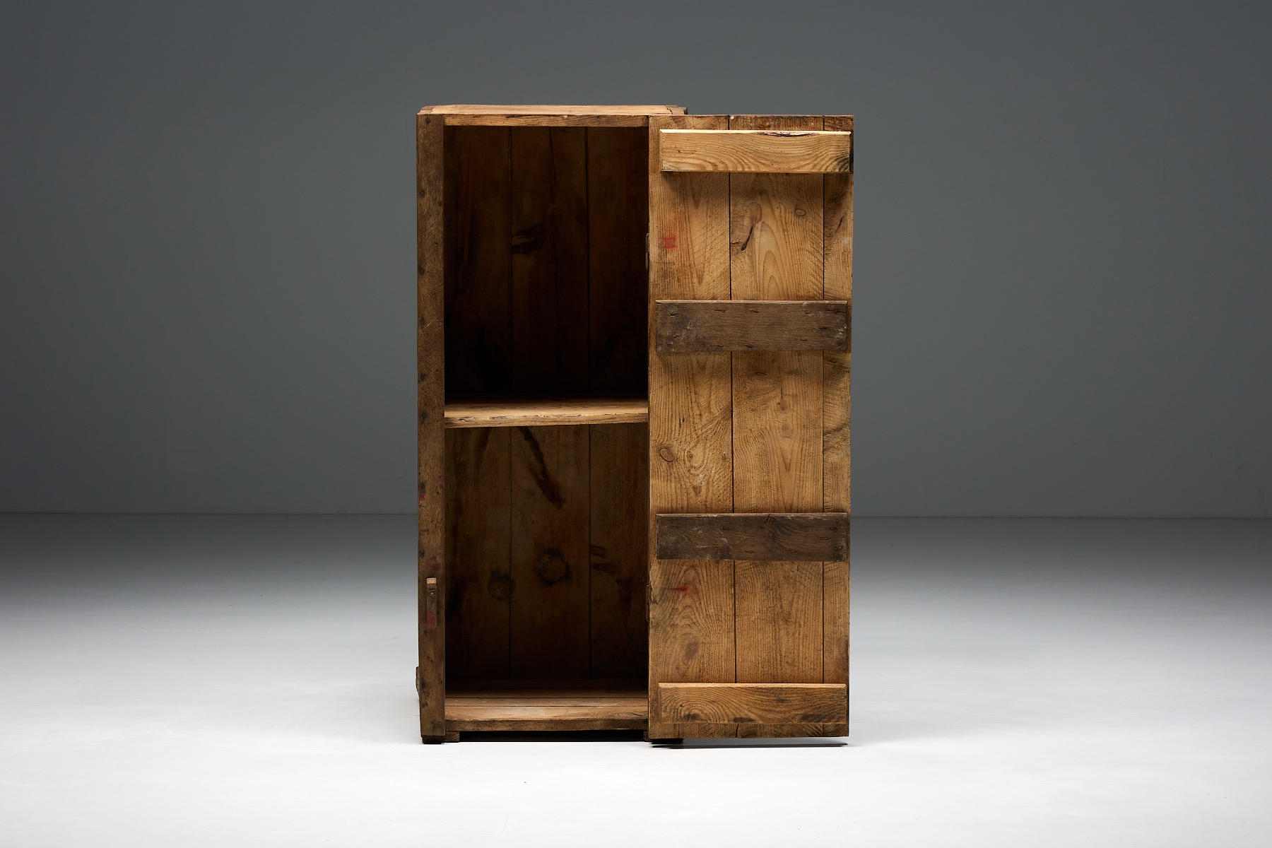 Primitive wooden cabinet in art populaire style