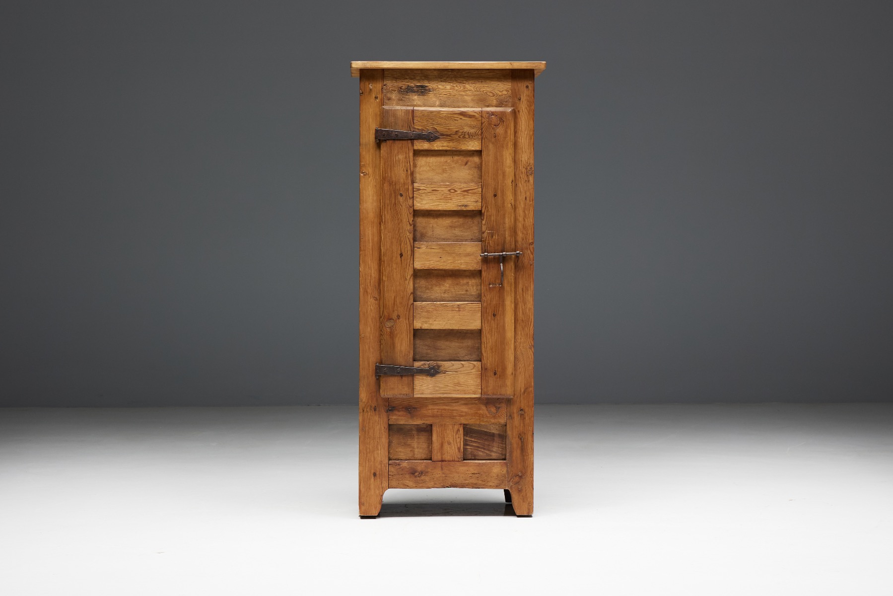 Primitive wooden cabinet with single door from France