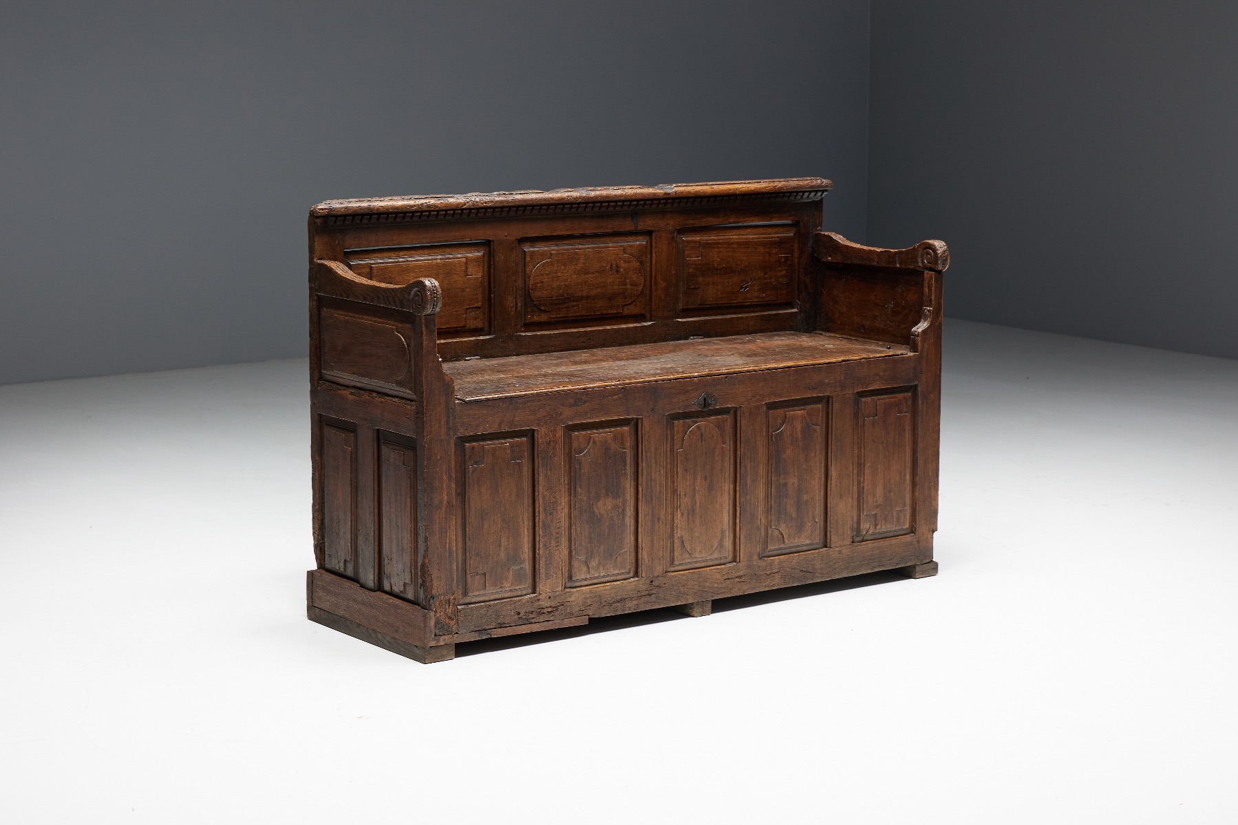 Primitive wooden storage bench in folk style