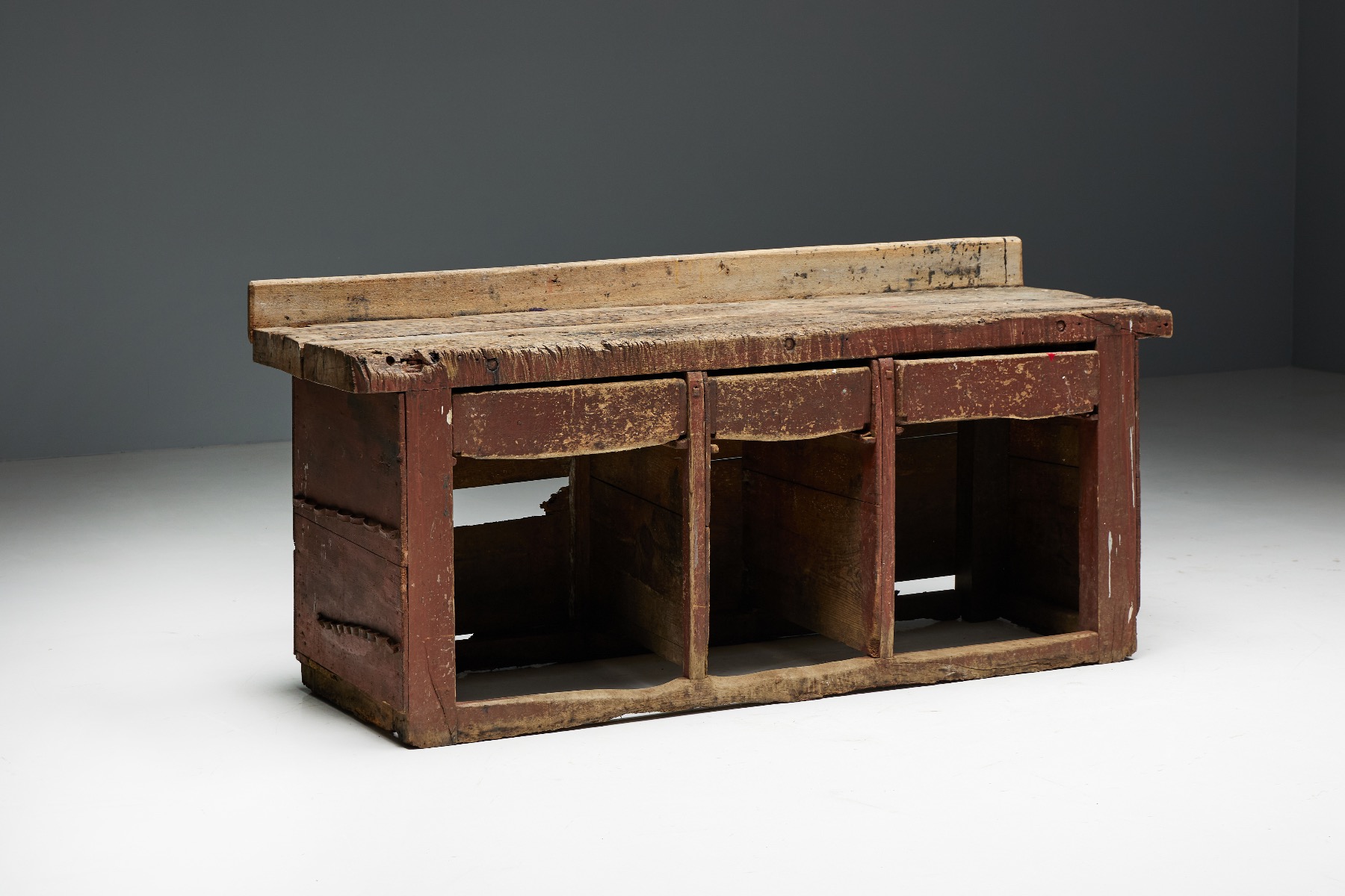 Primitive wooden workbench used as rustic counter