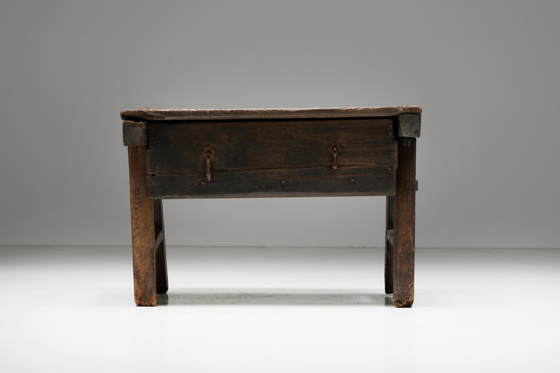 Primitive wooden writing table in folk style