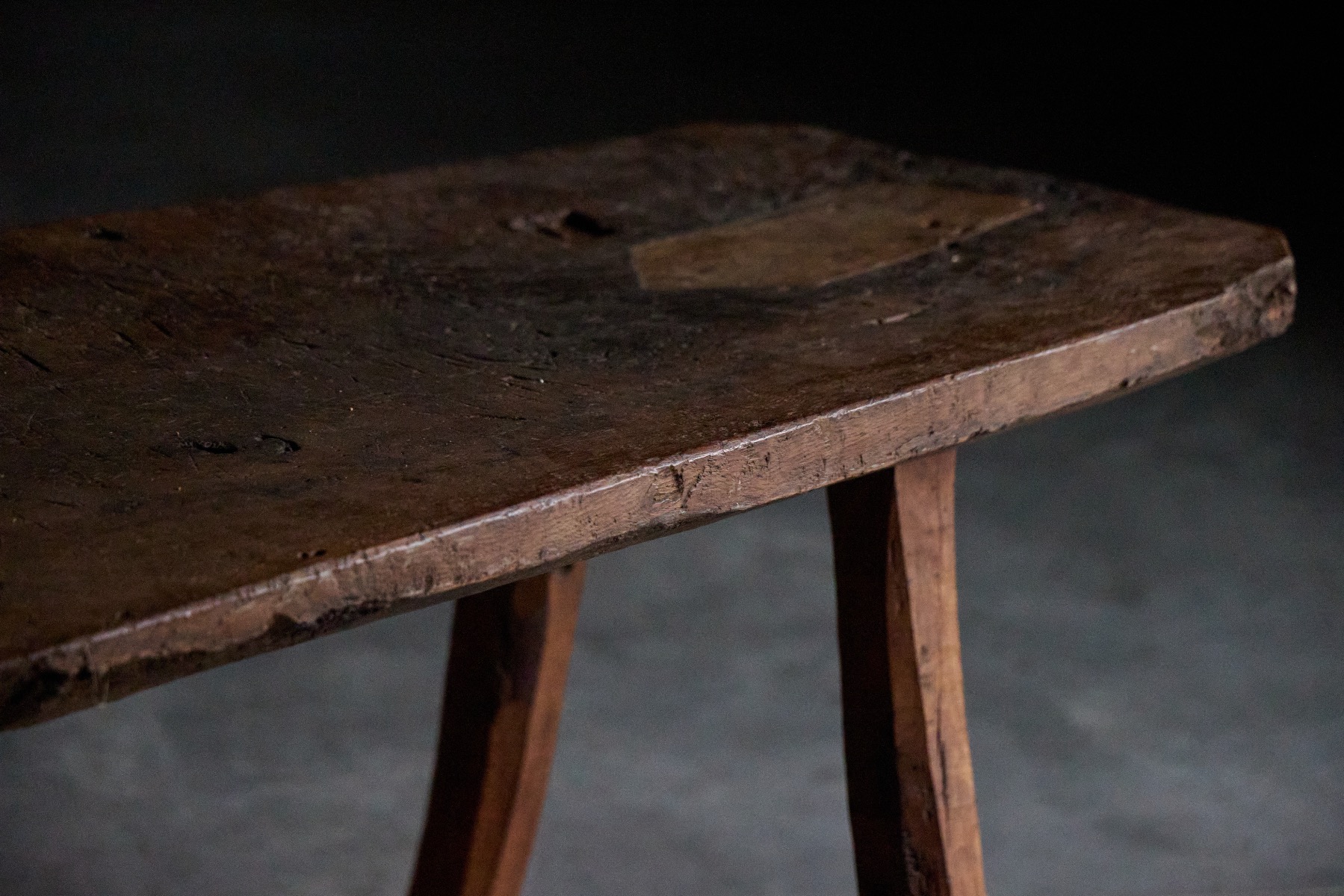 Rustic brutalist three leg side table in solid wood