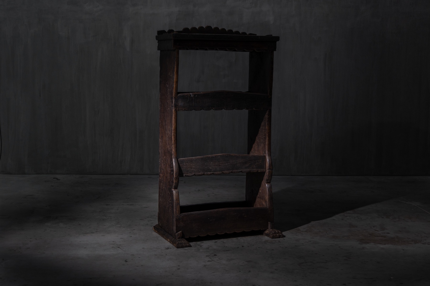 Primitive handcrafted wooden bookcase with aged patina