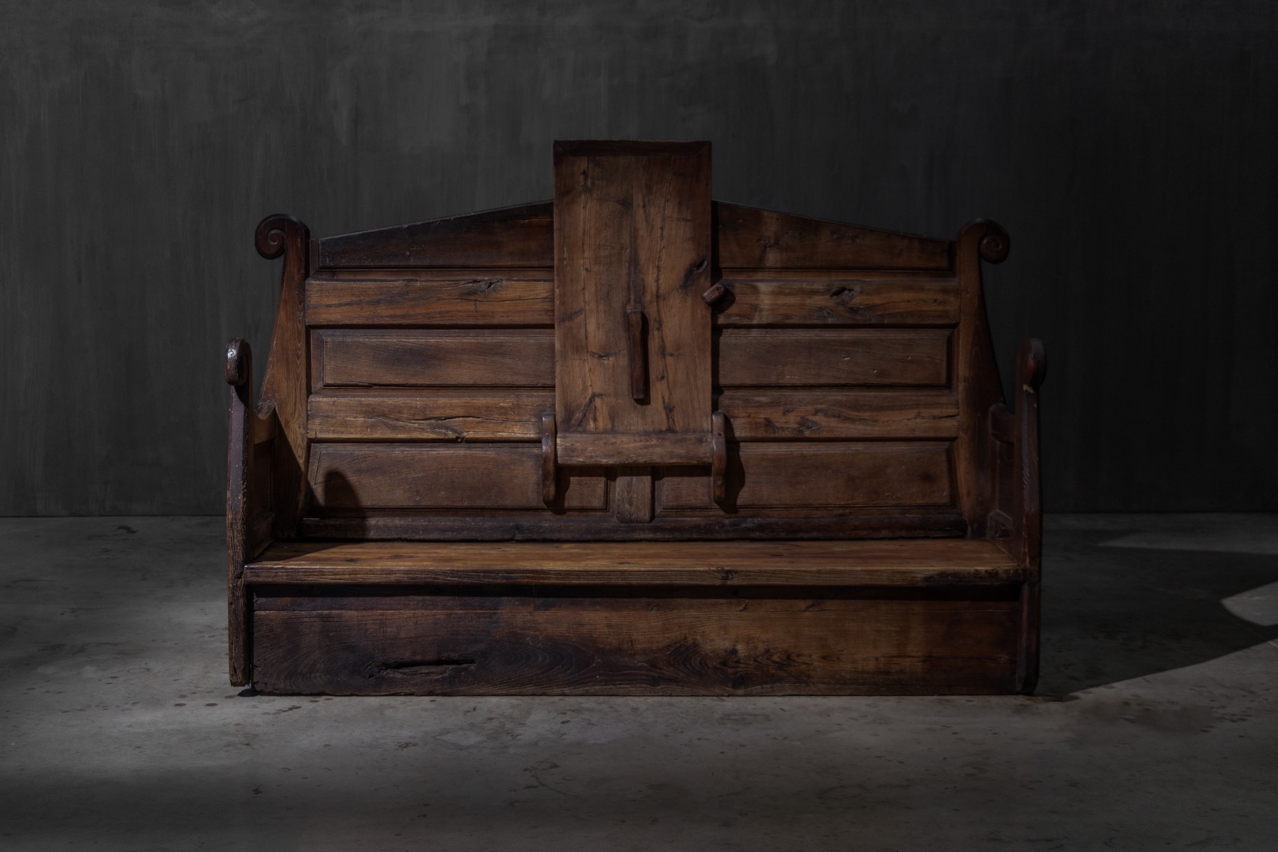 Rustic Alpine wooden bench with functional folding table