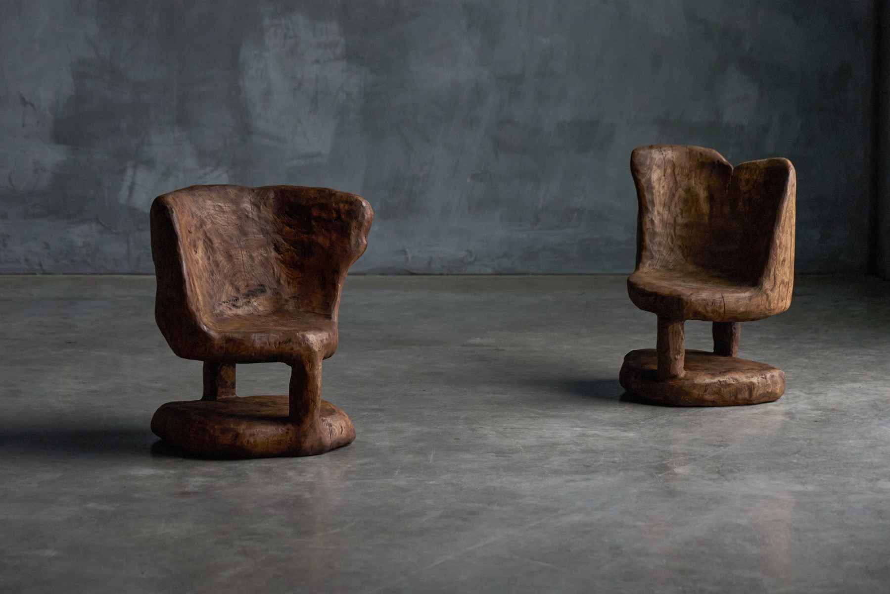 Hand carved brutalist seating in monoxyle form