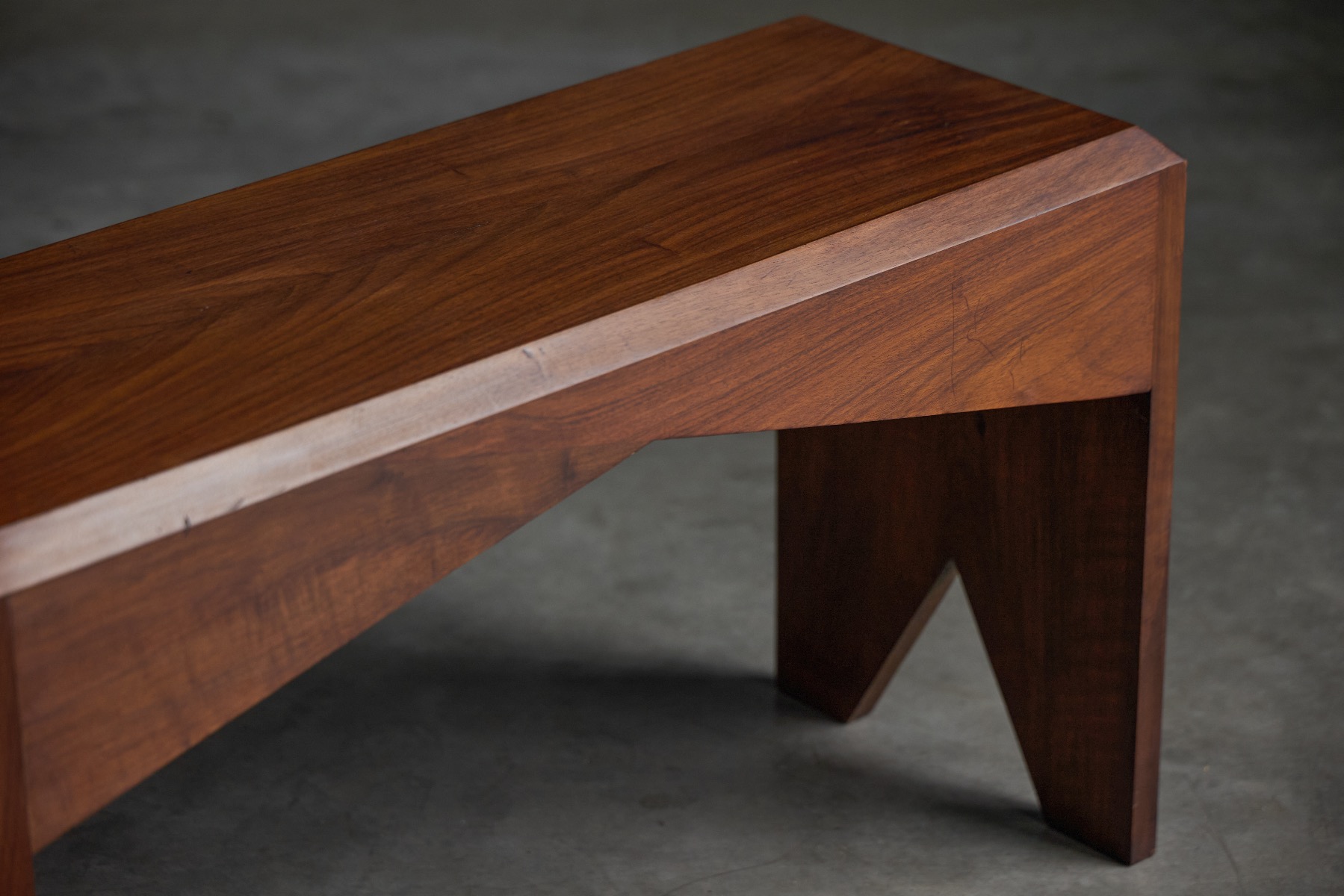 Vintage walnut bench with clean modernist proportions