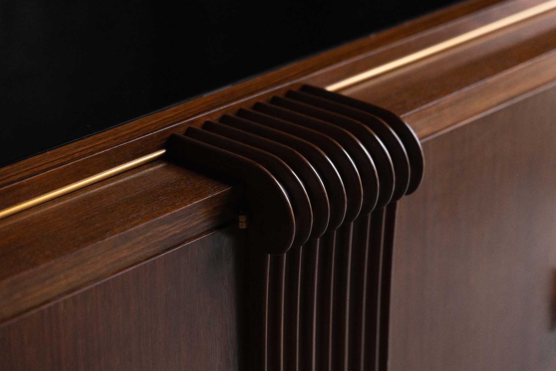 Art Deco walnut sideboard with refined brass accents